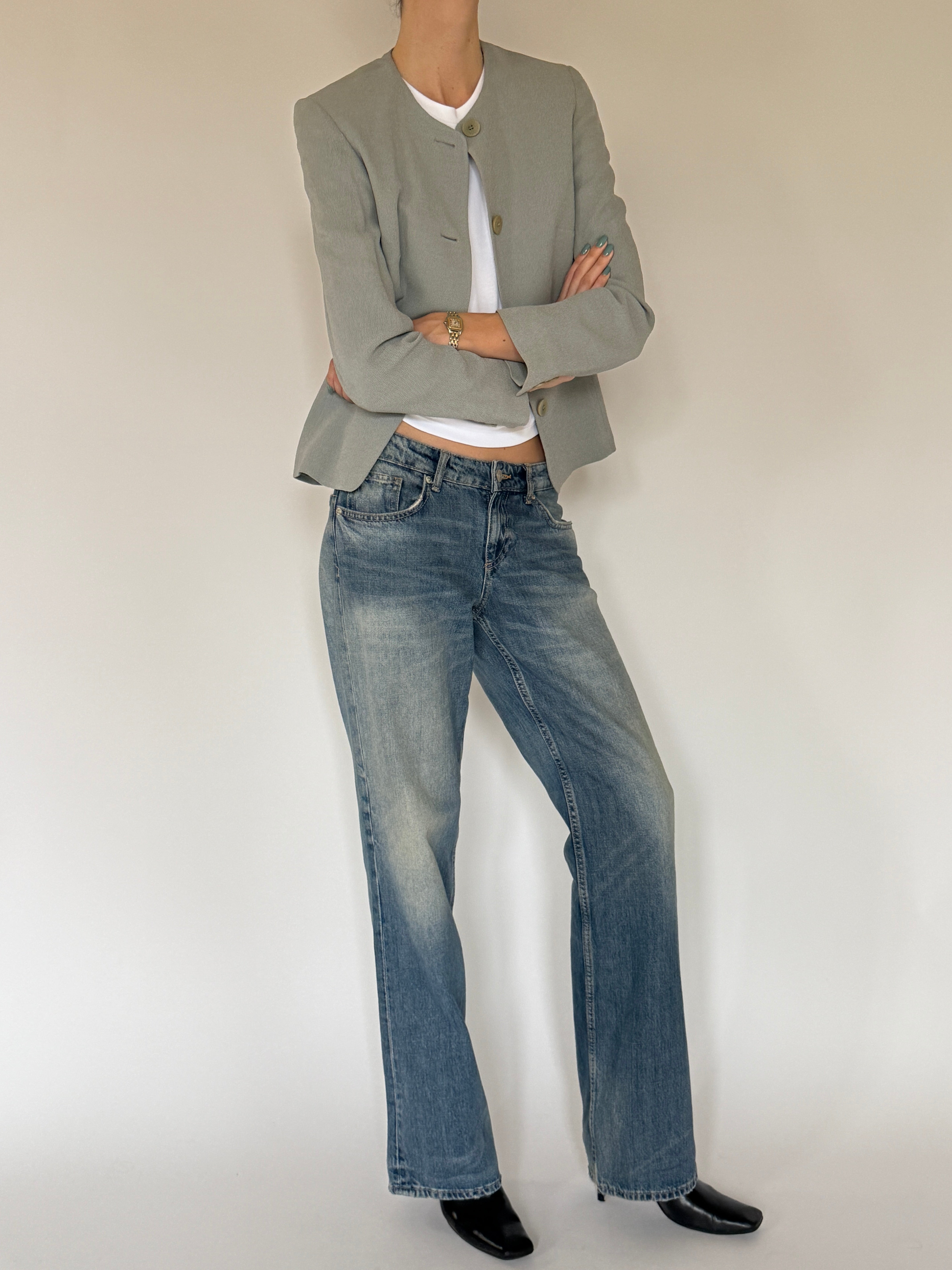 Vintage sage green collarless jacket side view