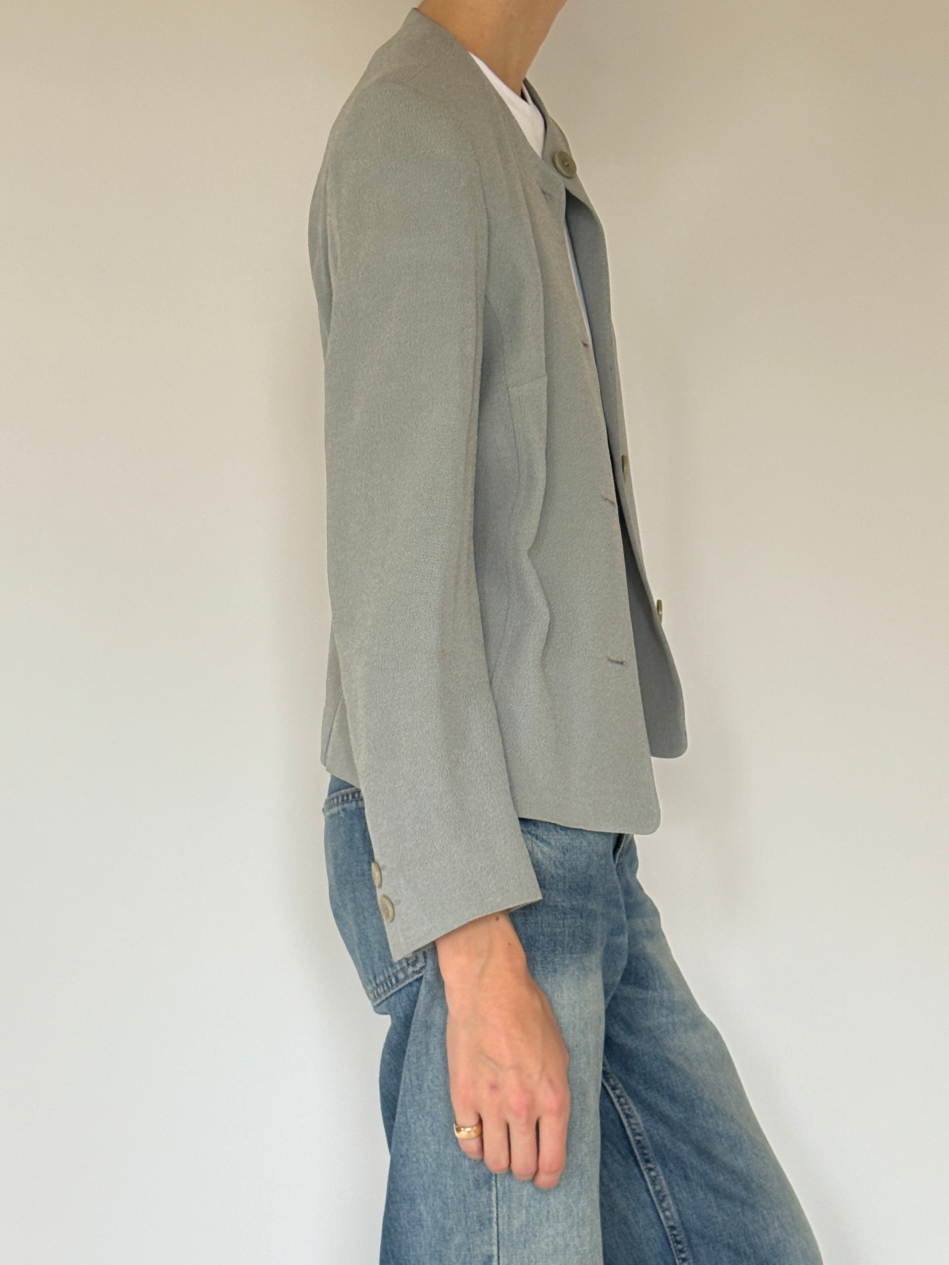 Vintage sage green collarless jacket side view
