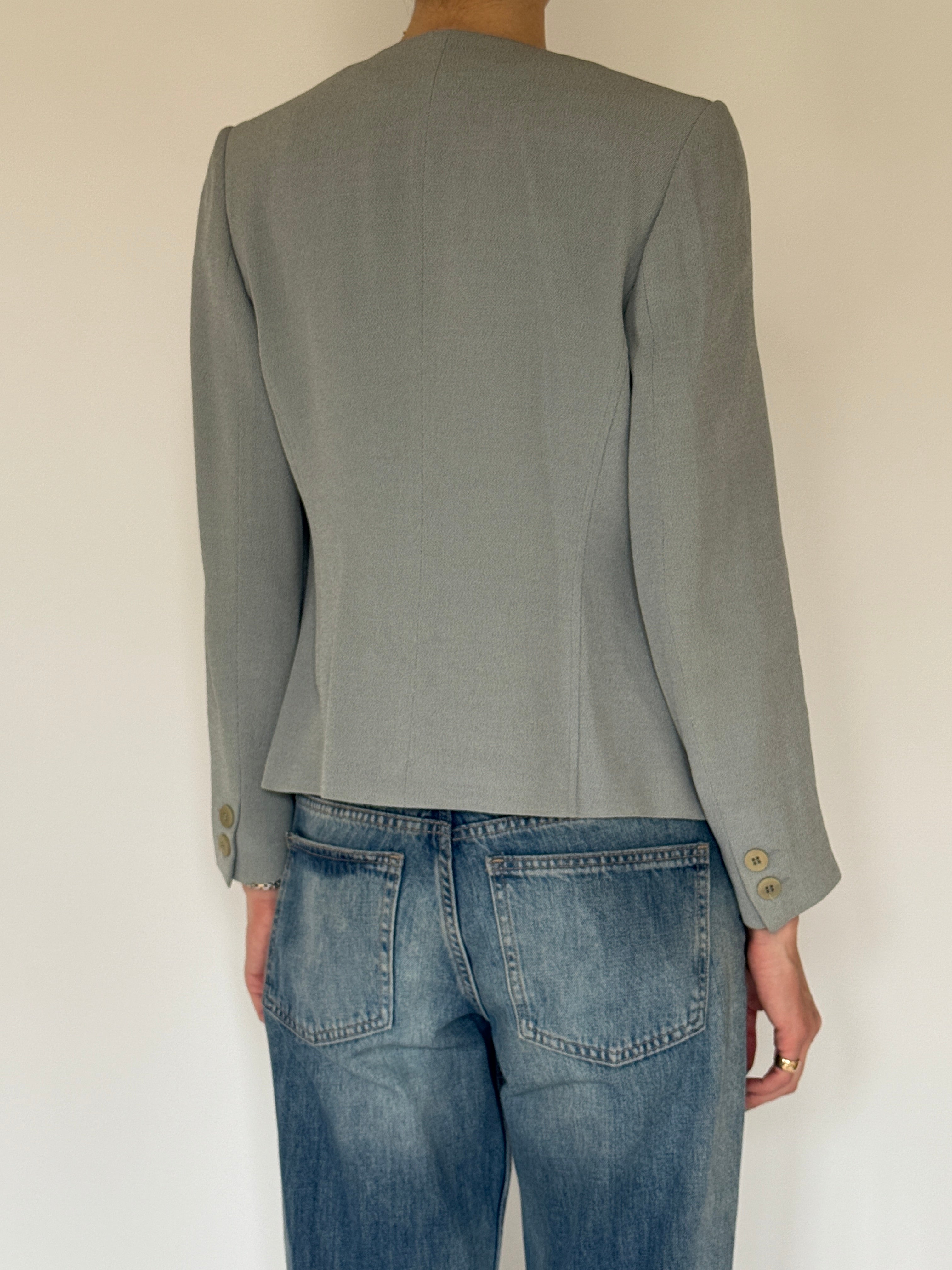 Vintage sage green collarless jacket back view
