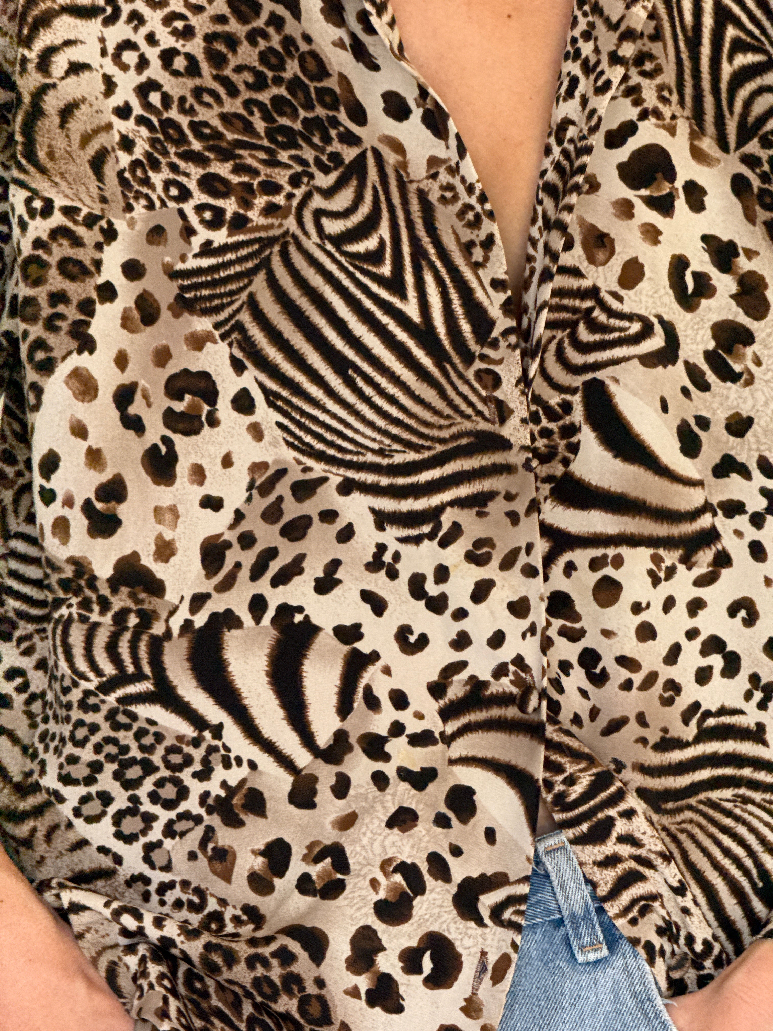 Vintage animal print blouse fabric close-up
