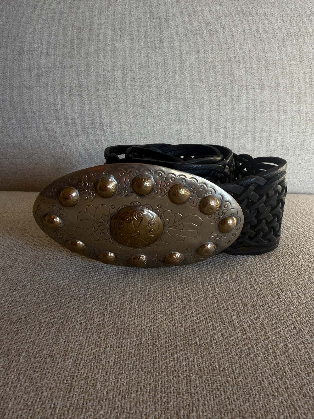 Vintage western statement buckle belt black braided leather front view