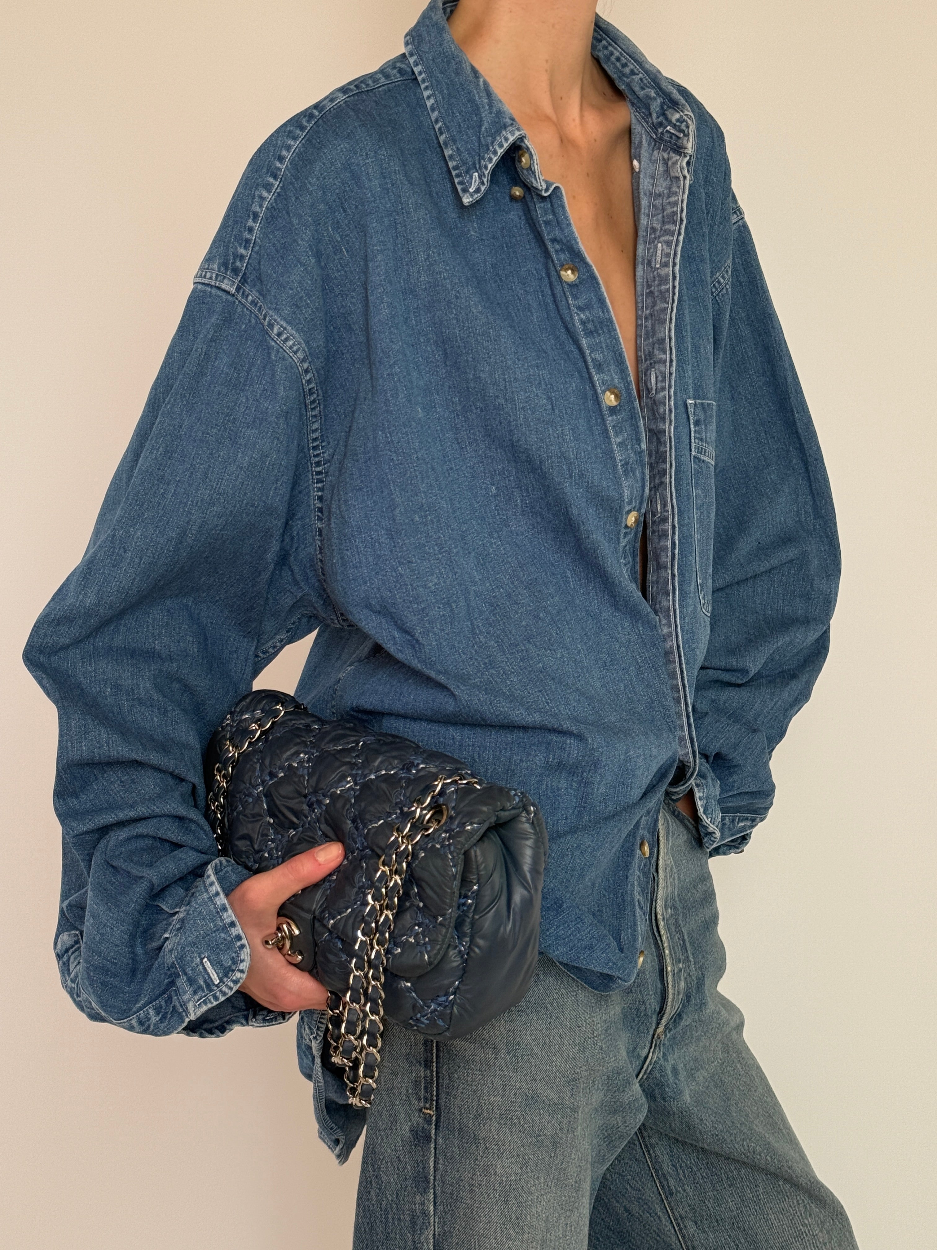 Vintage blue denim button-up shirt front view