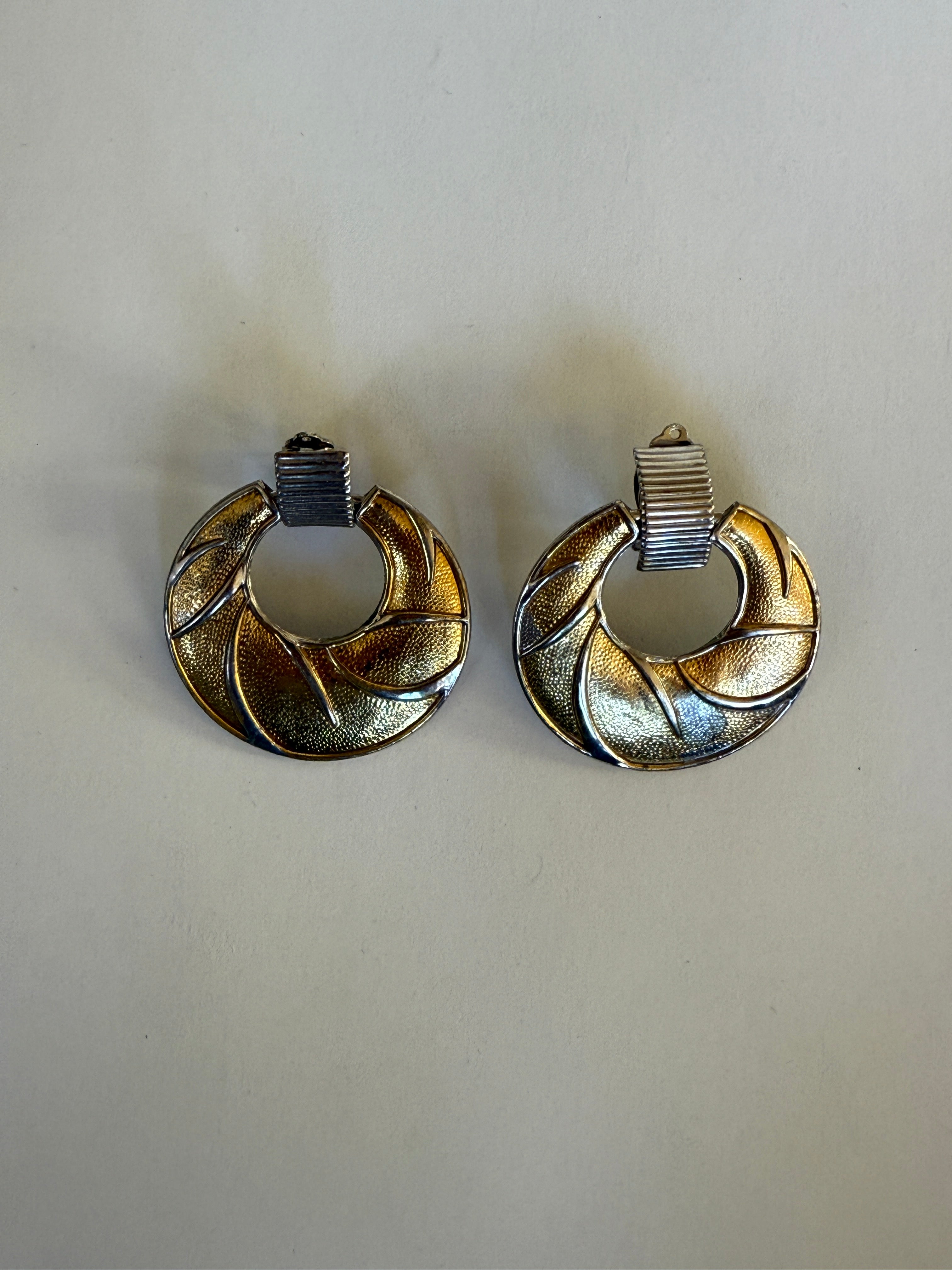 Vintage two-tone gold and silver swirl clip-on earrings front view