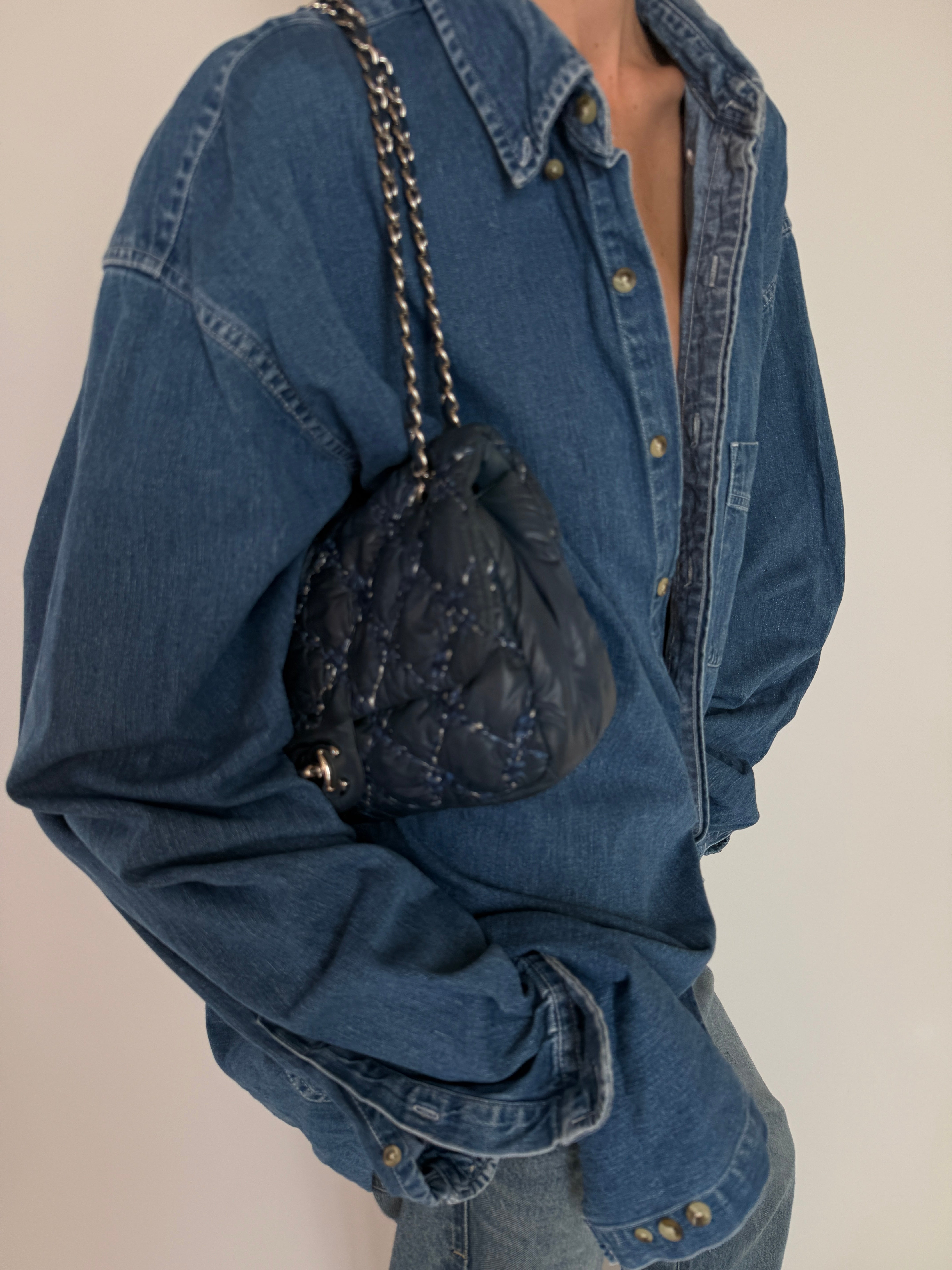 Vintage blue denim button-up shirt front view