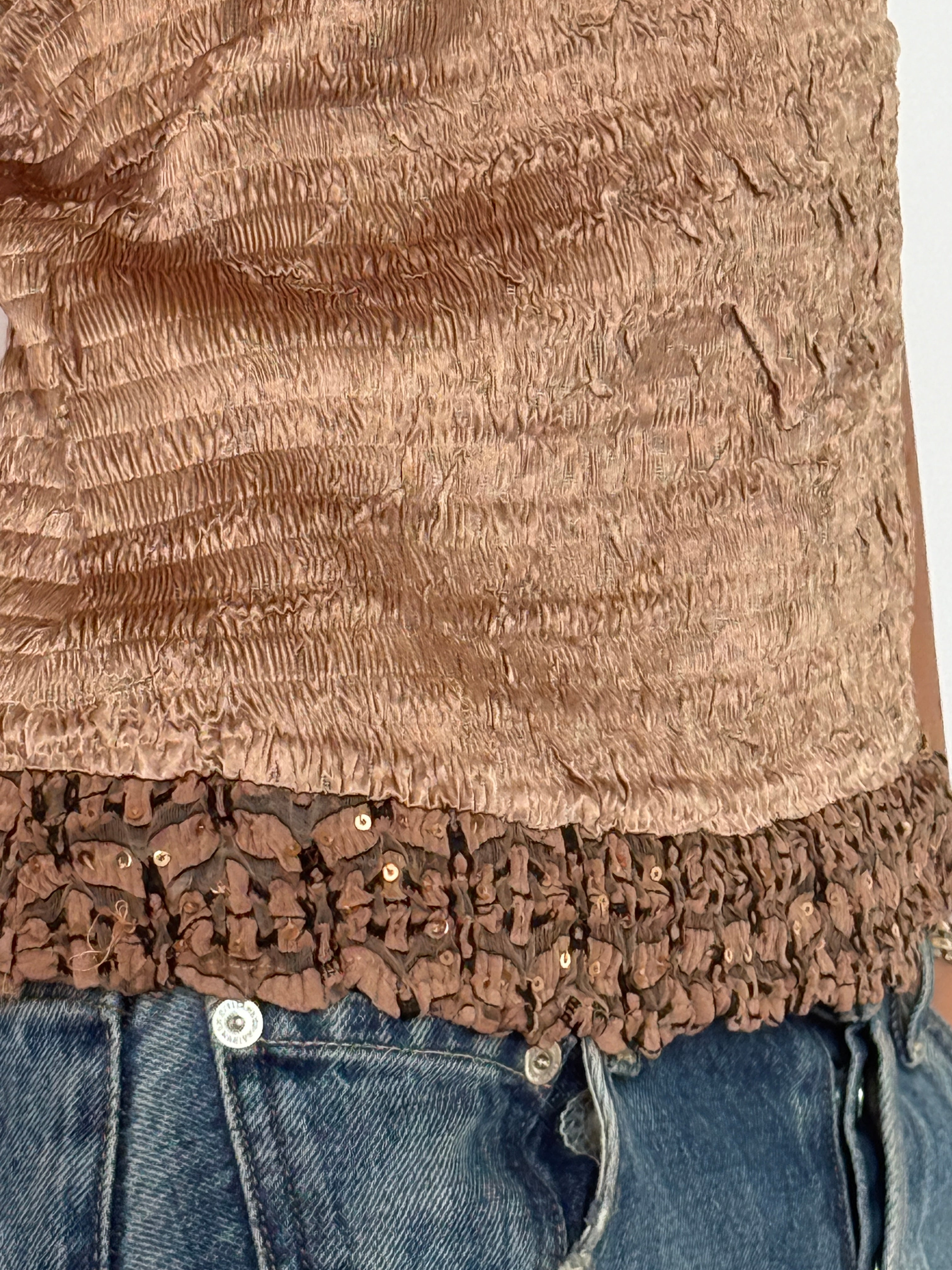 Vintage brown textured fabric close-up sleeveless top