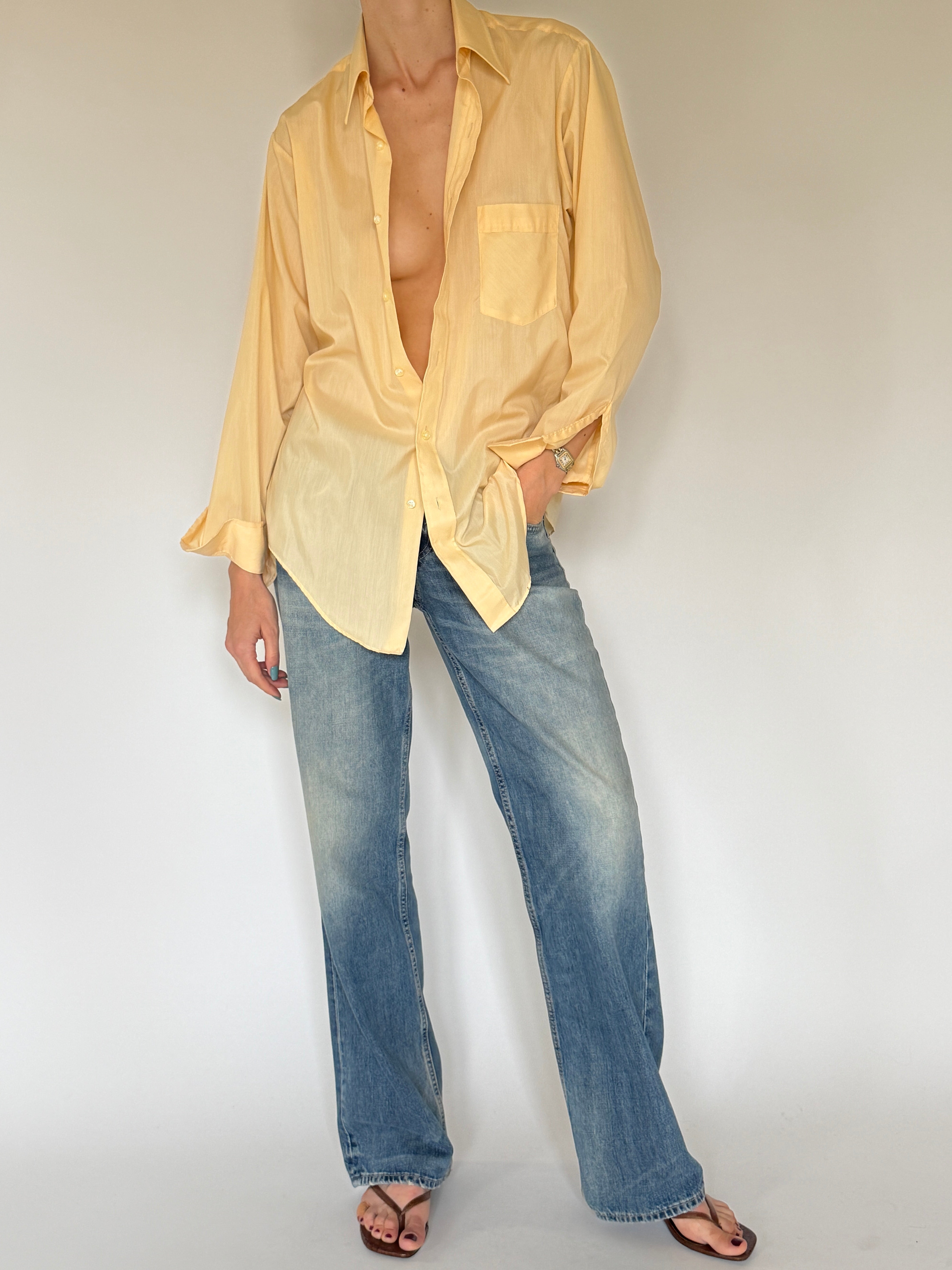 Vintage butter yellow shirt angled view