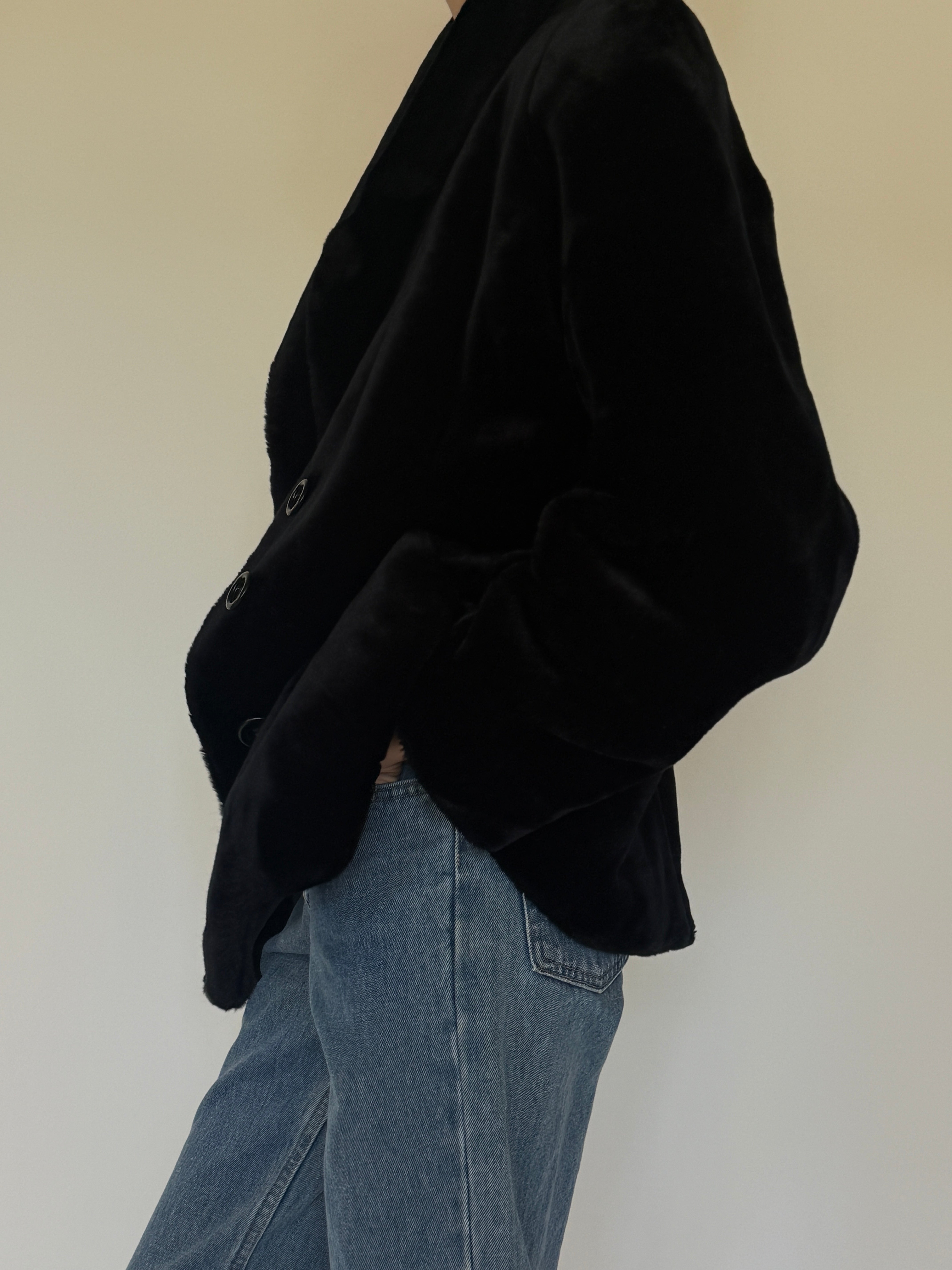 Vintage black faux fur coat side view