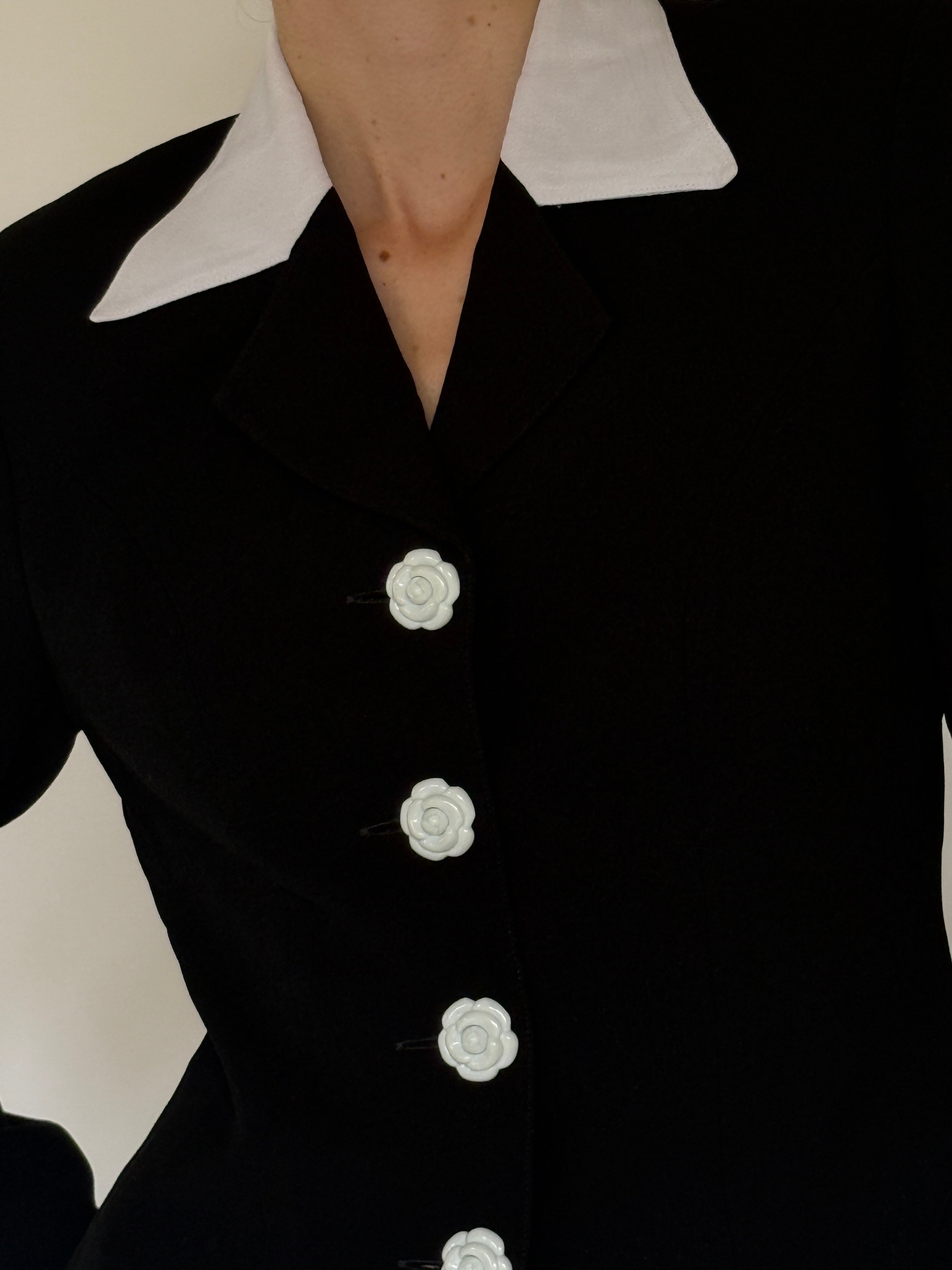 Vintage black blazer fabric close-up