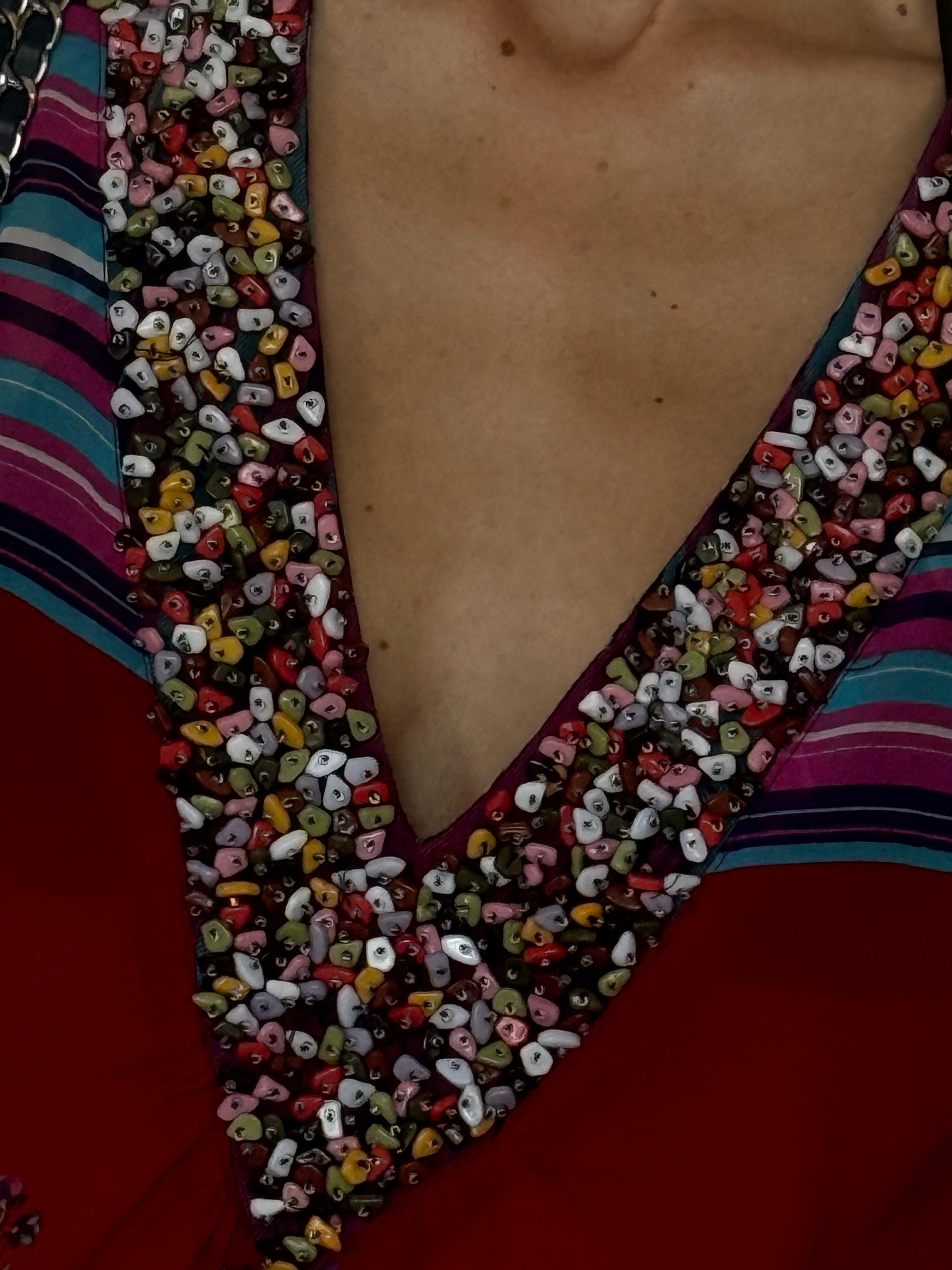 Hand-beaded V-neckline detail