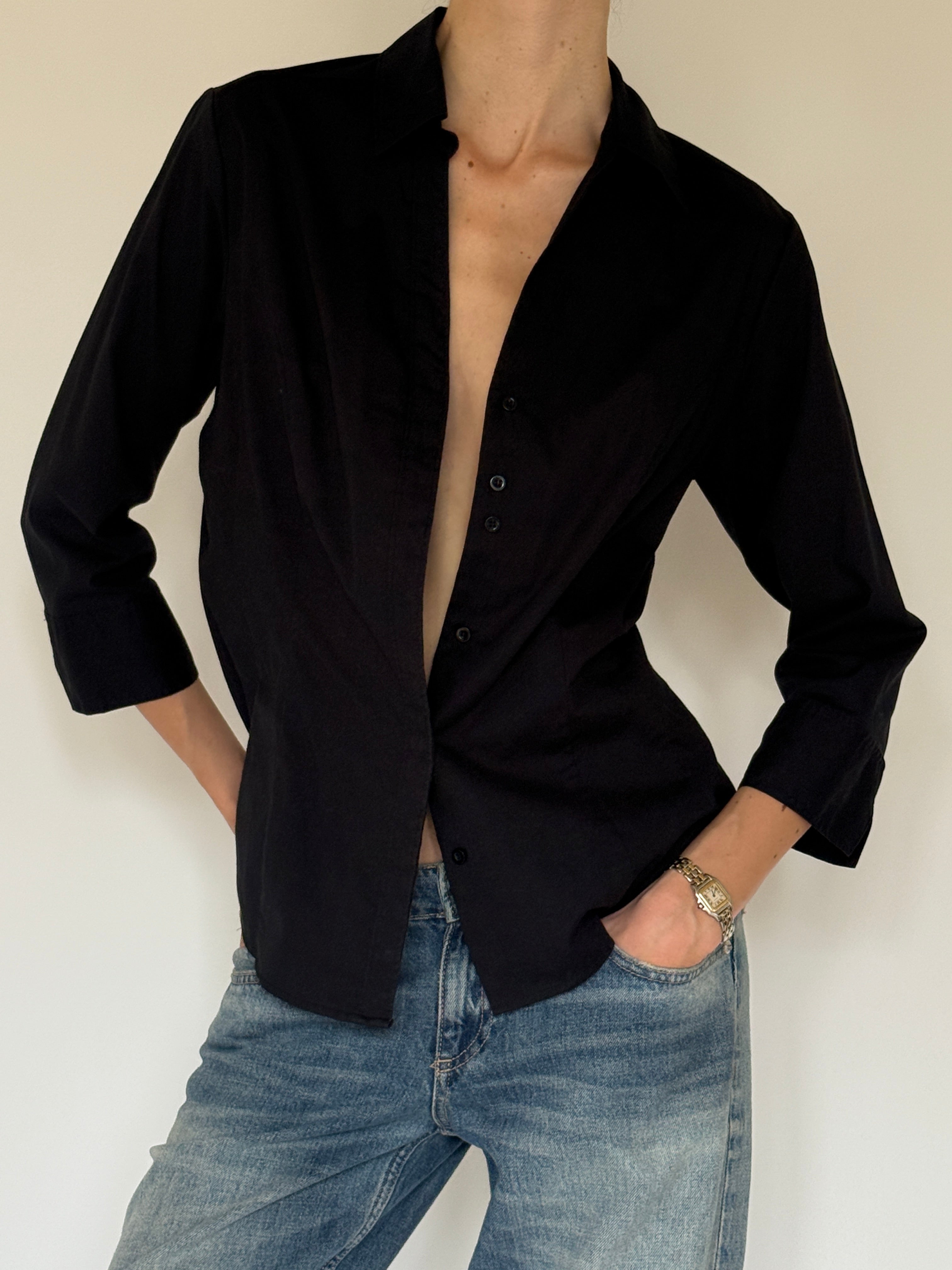 Vintage black button-up fabric close-up