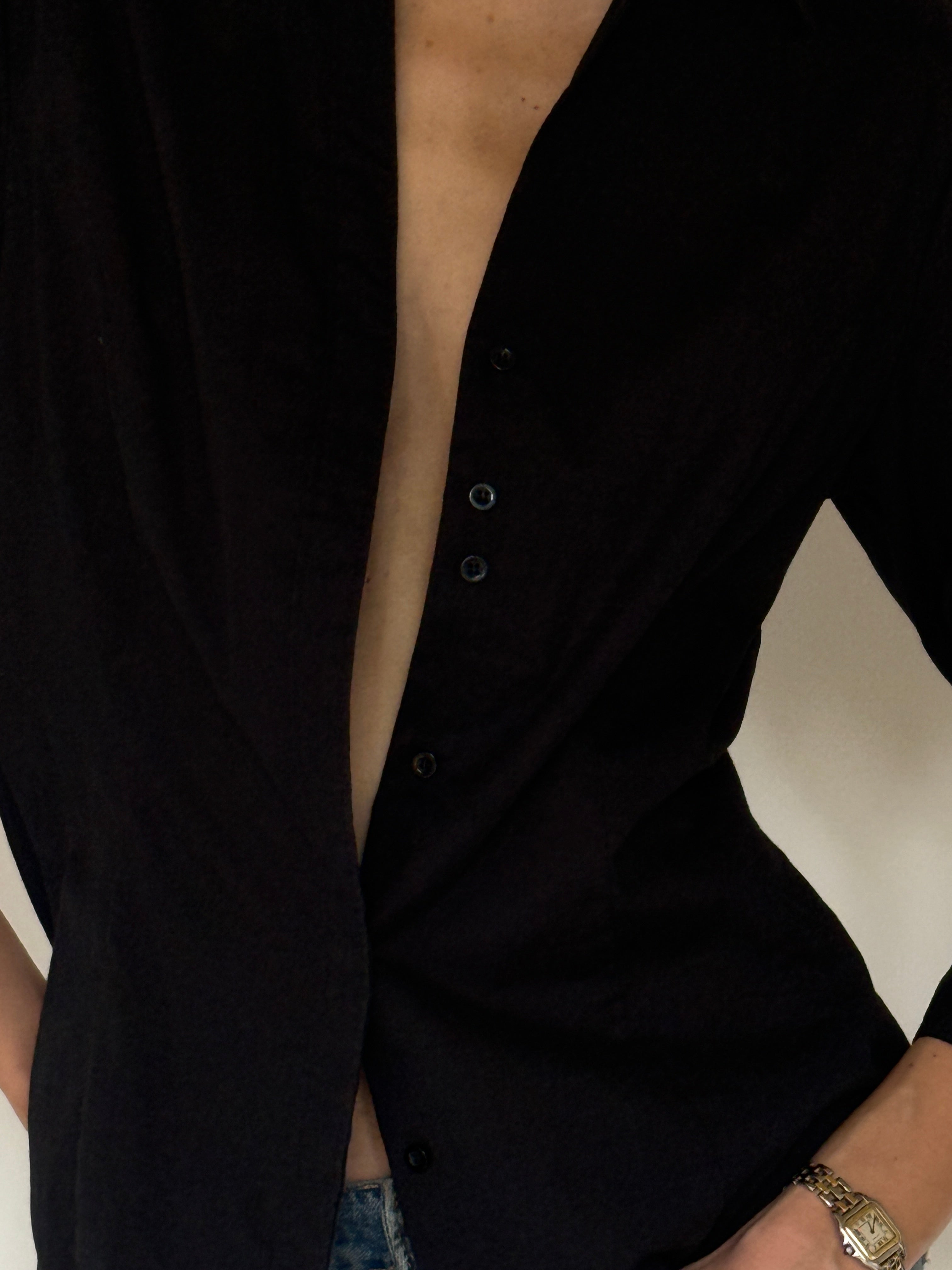 Vintage black button-up fabric close-up
