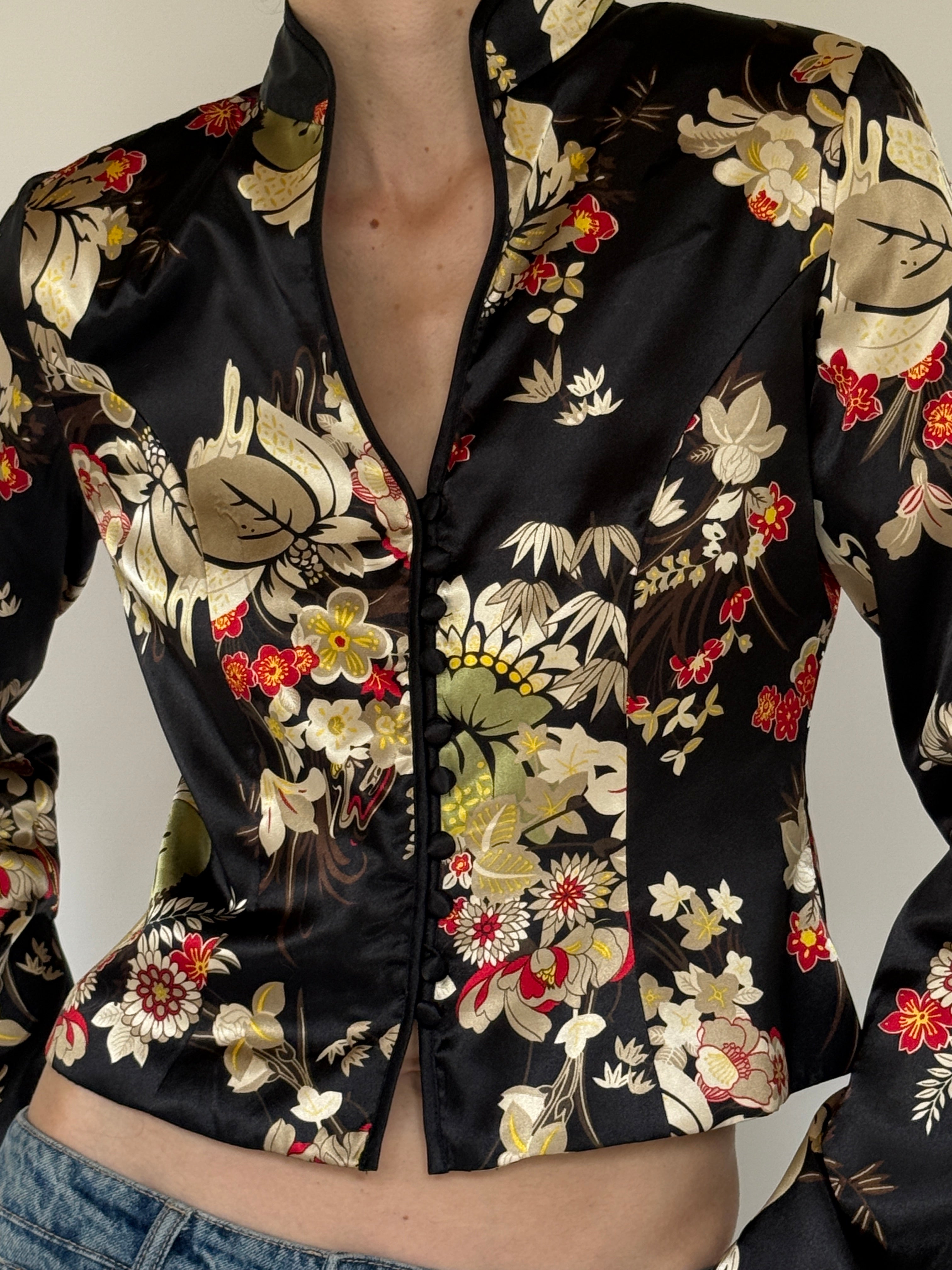 Vintage satin floral fabric close-up