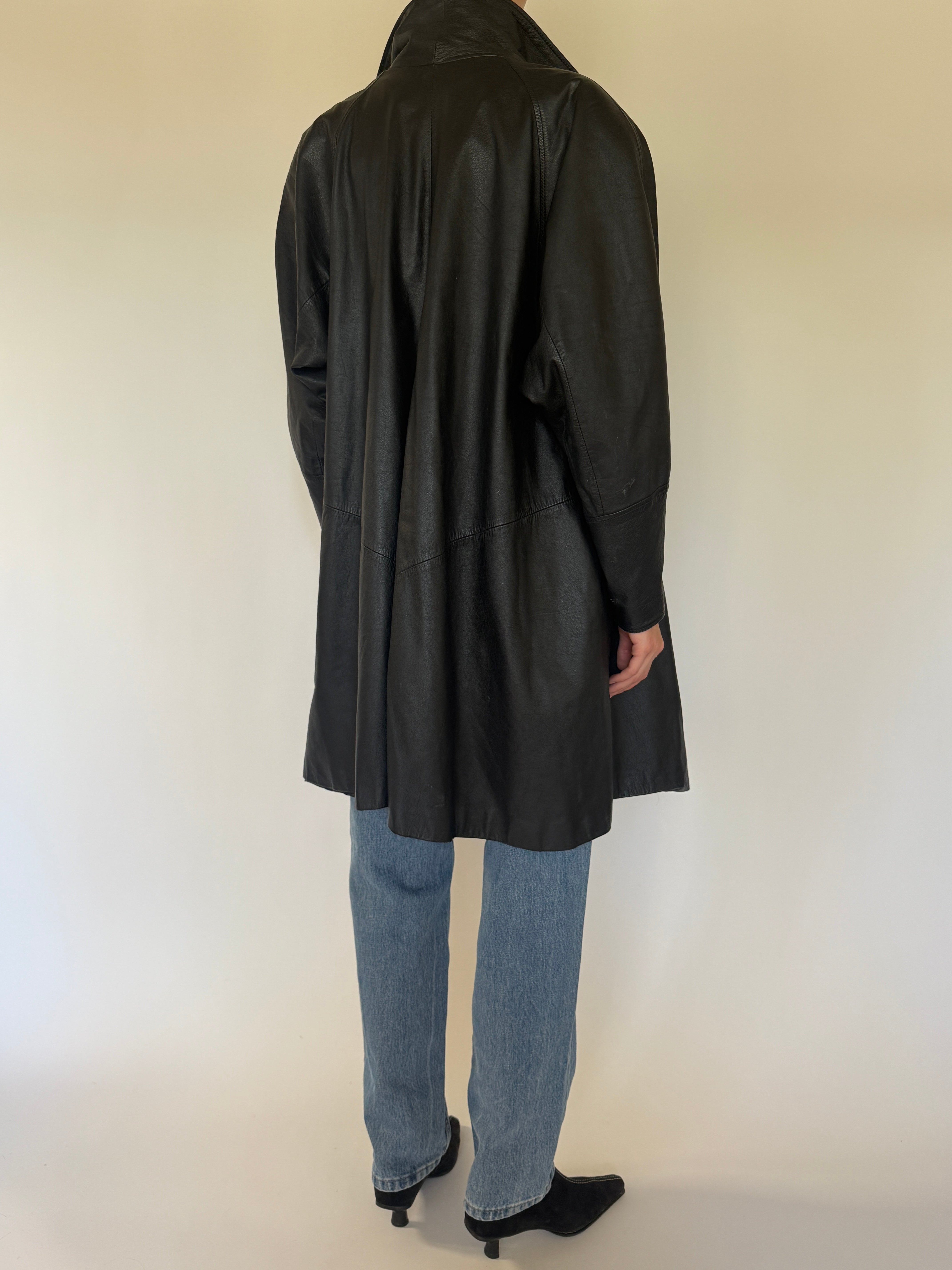 Vintage black leather coat back view