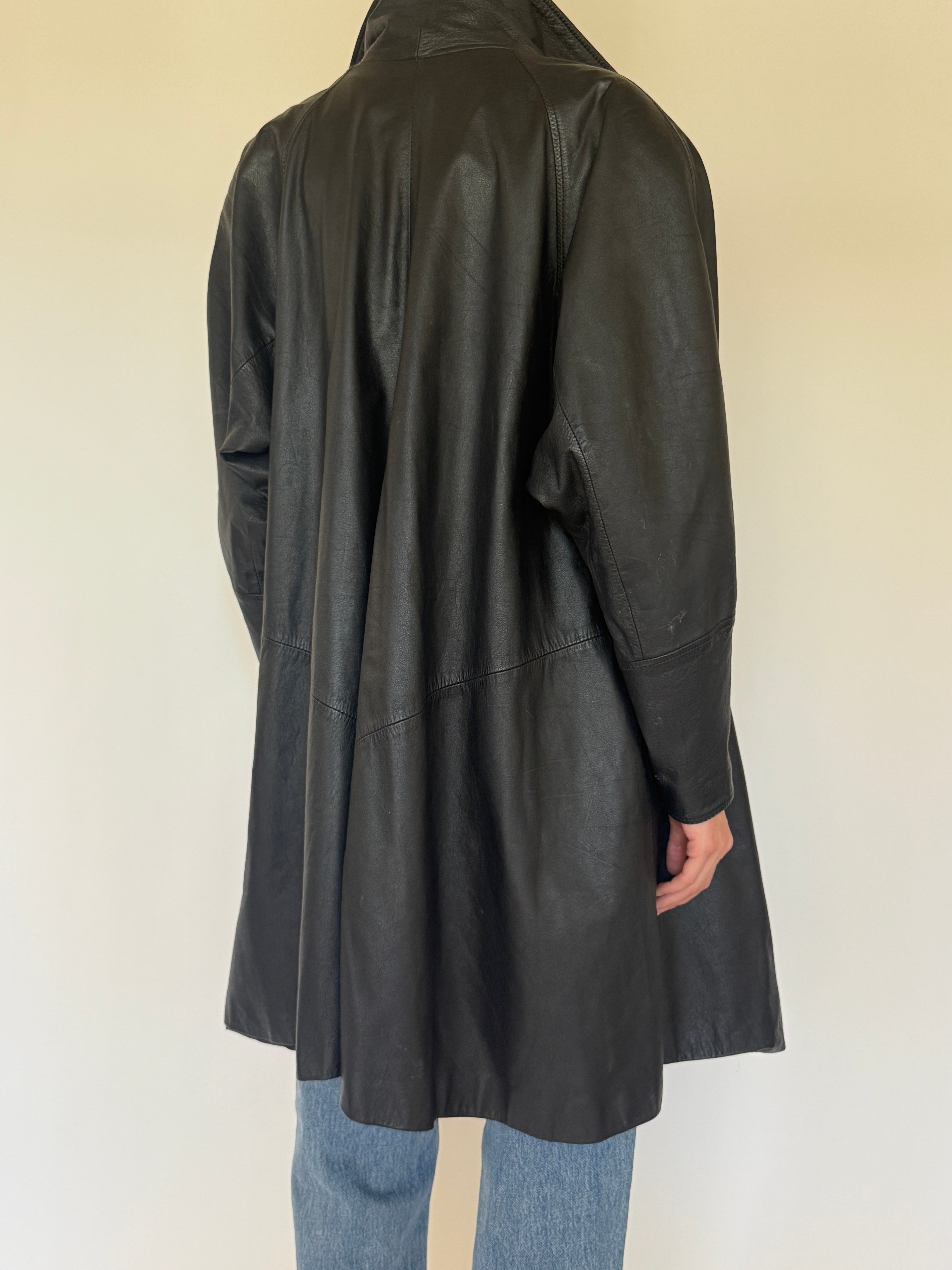 Vintage black leather coat back view