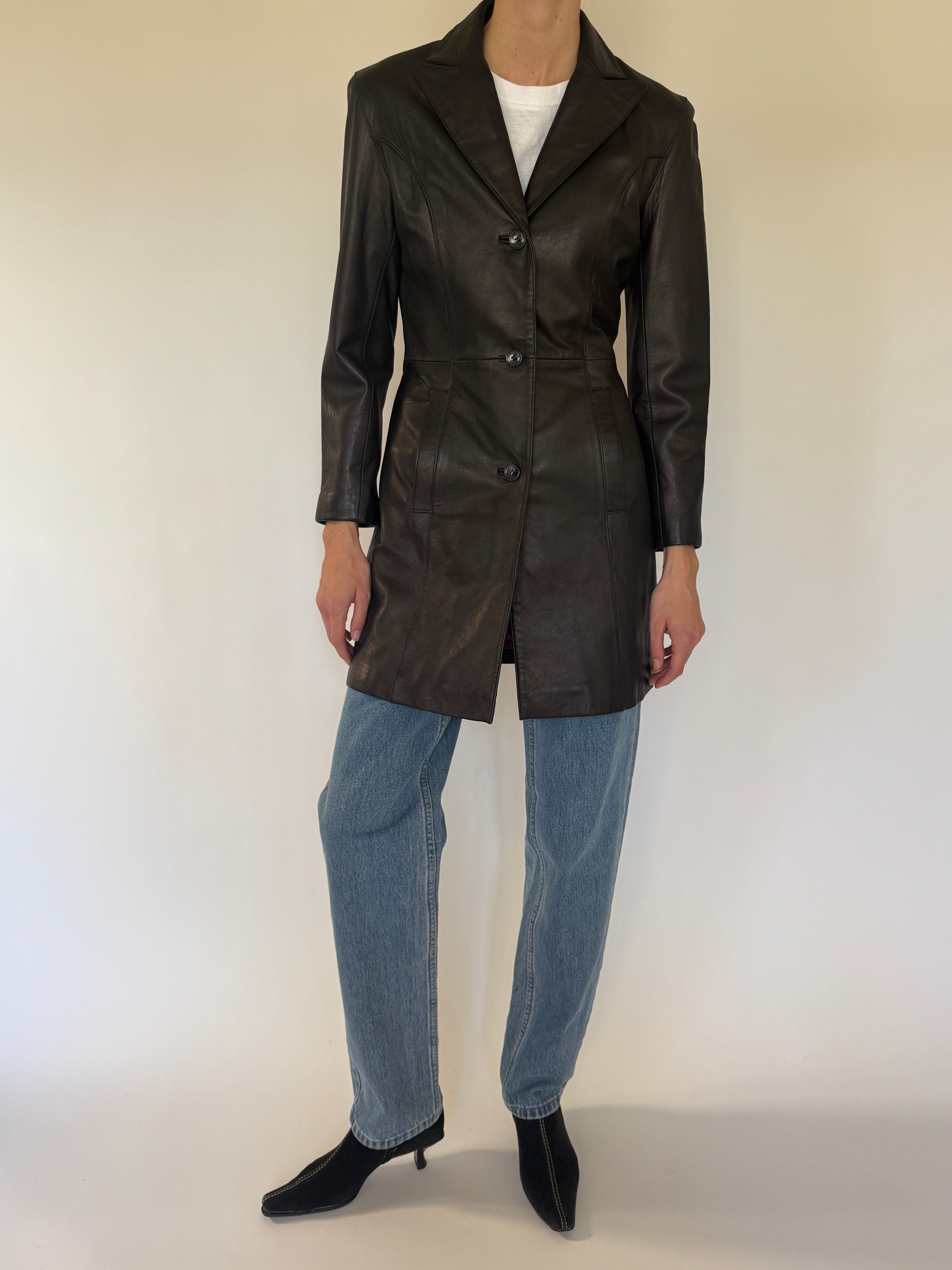 Vintage dark brown leather jacket lapel collar detail