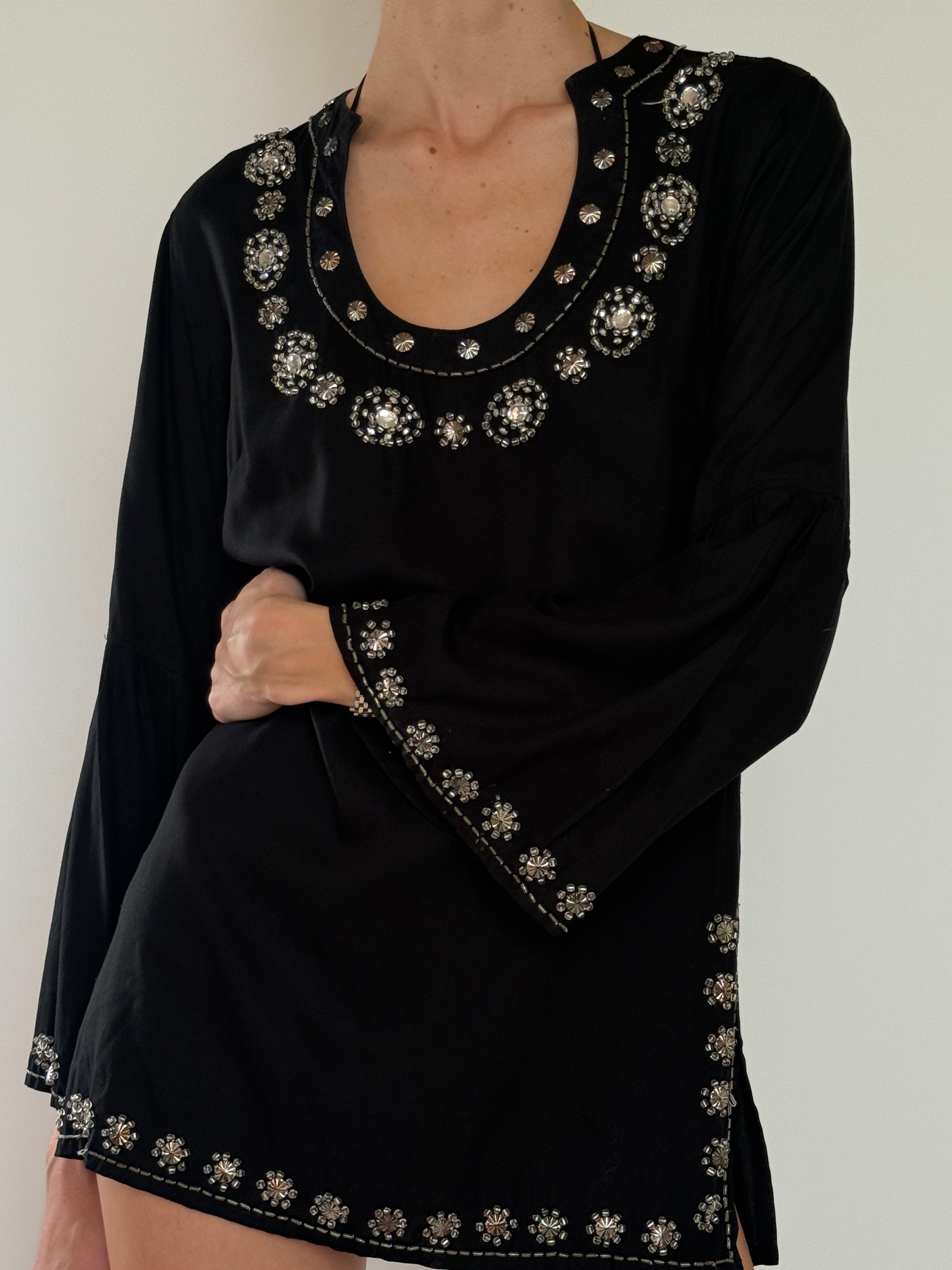 Black vintage tunic dress featuring silver sequin and bead detailing at neckline