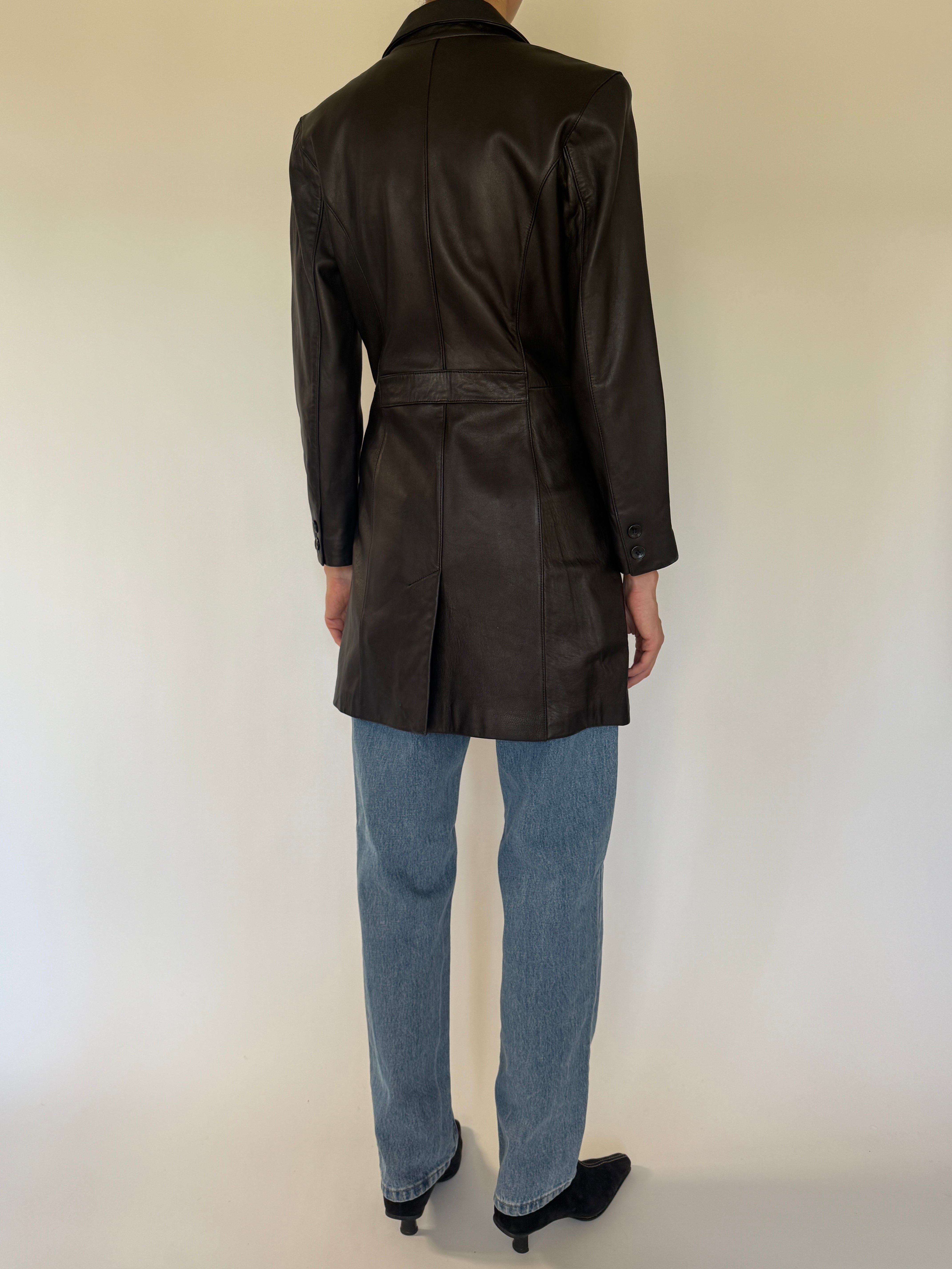 Vintage dark brown leather jacket back view