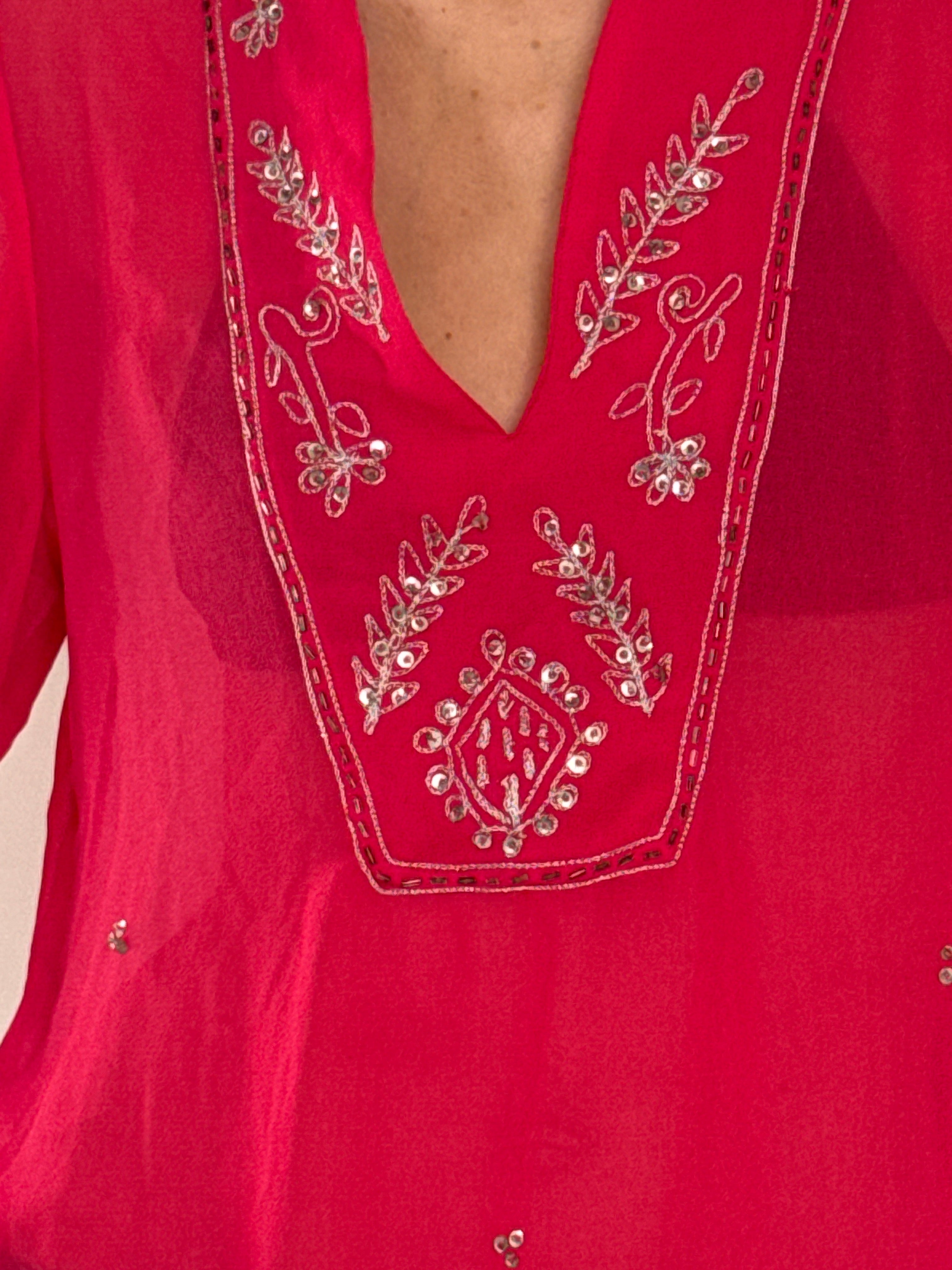 Vintage pink sheer cover-up fabric close-up