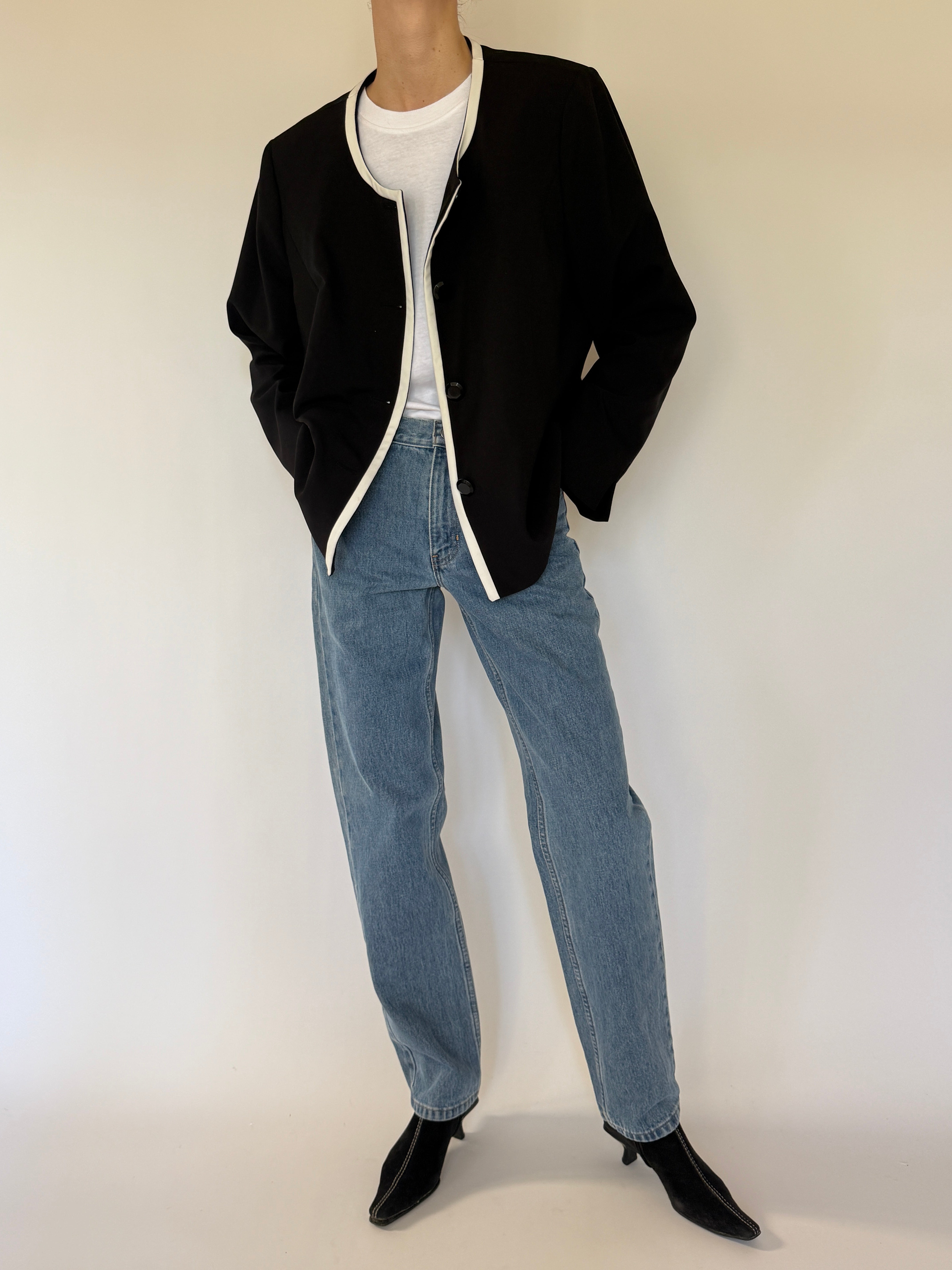 Vintage black collarless jacket with ivory trim front view