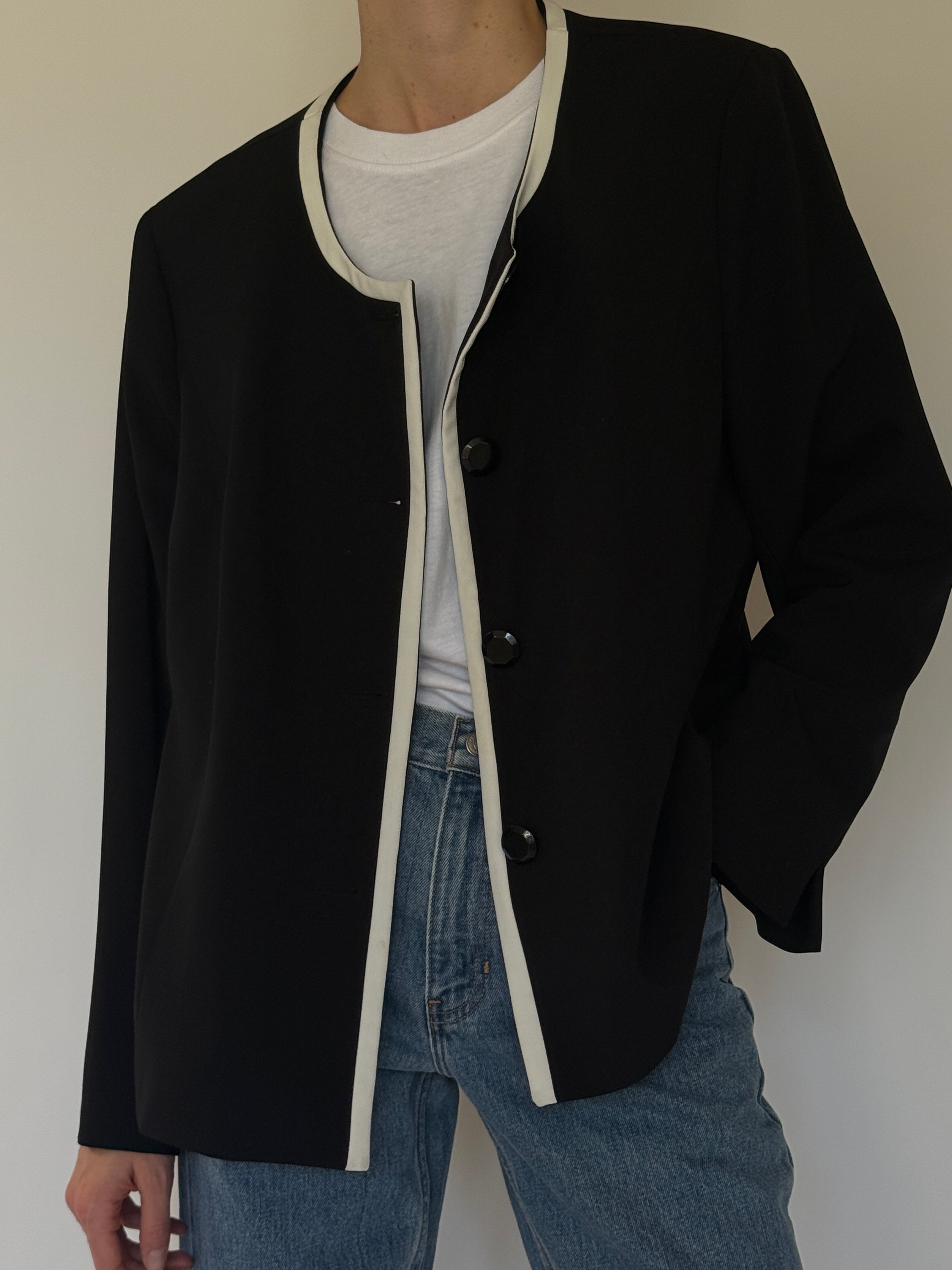 Vintage black collarless jacket with ivory trim front view