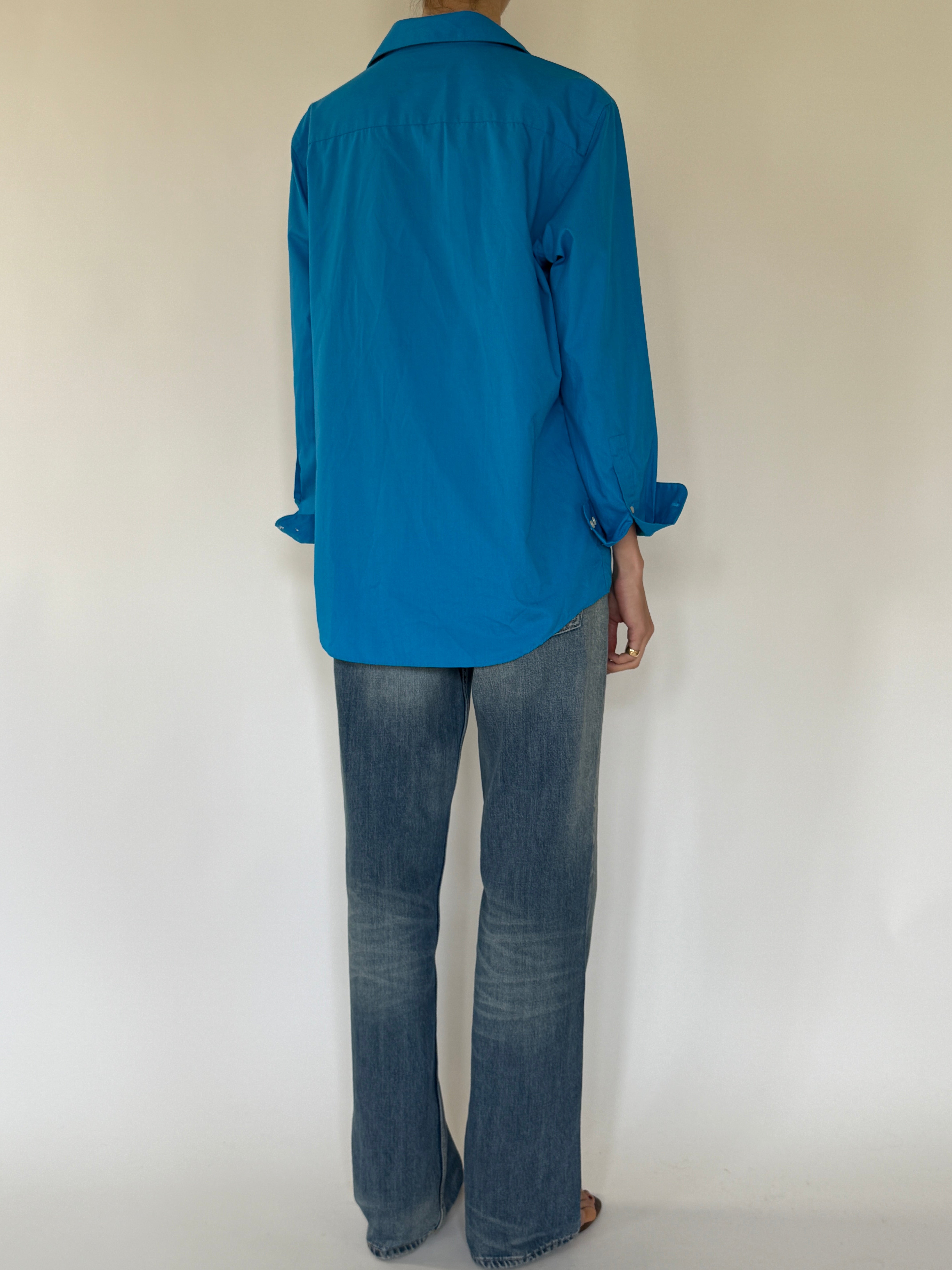 Vintage blue button-up shirt back view