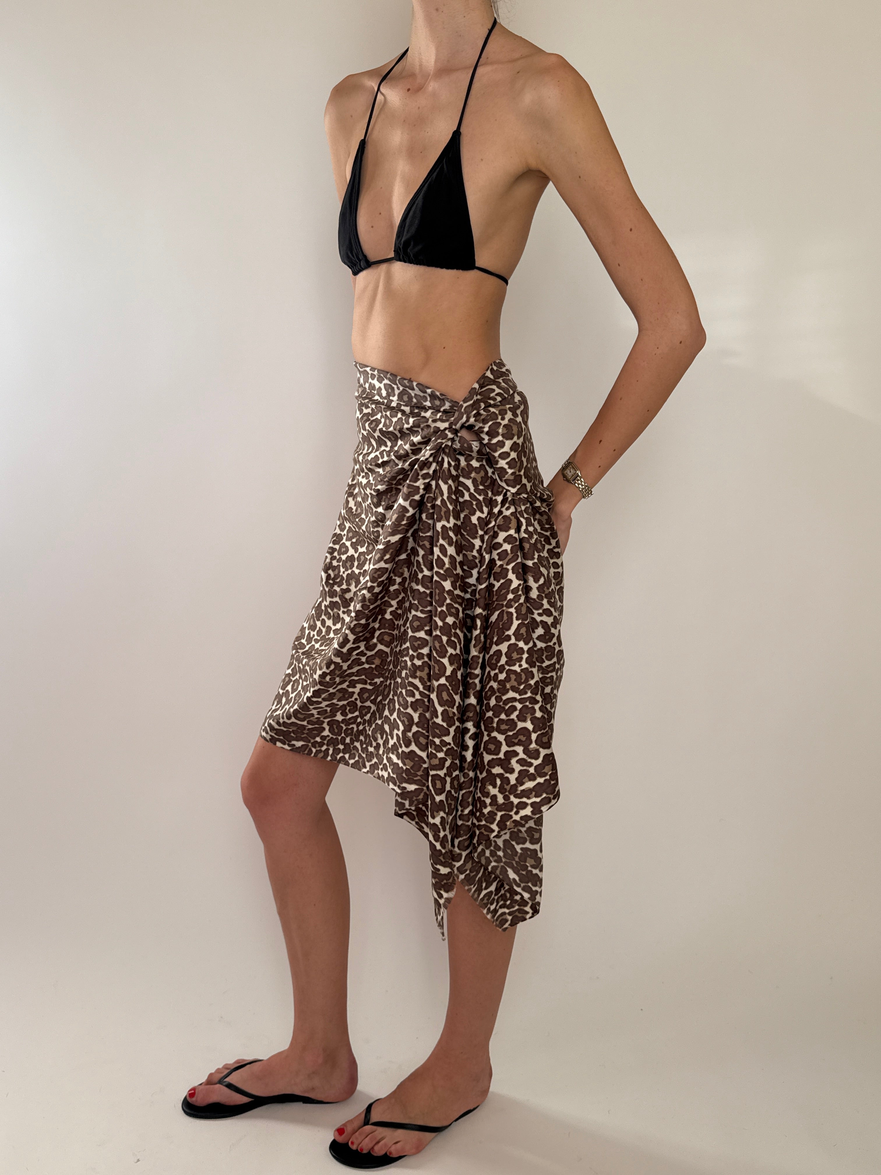 Leopard sarong showing long tie ends and wrap shape