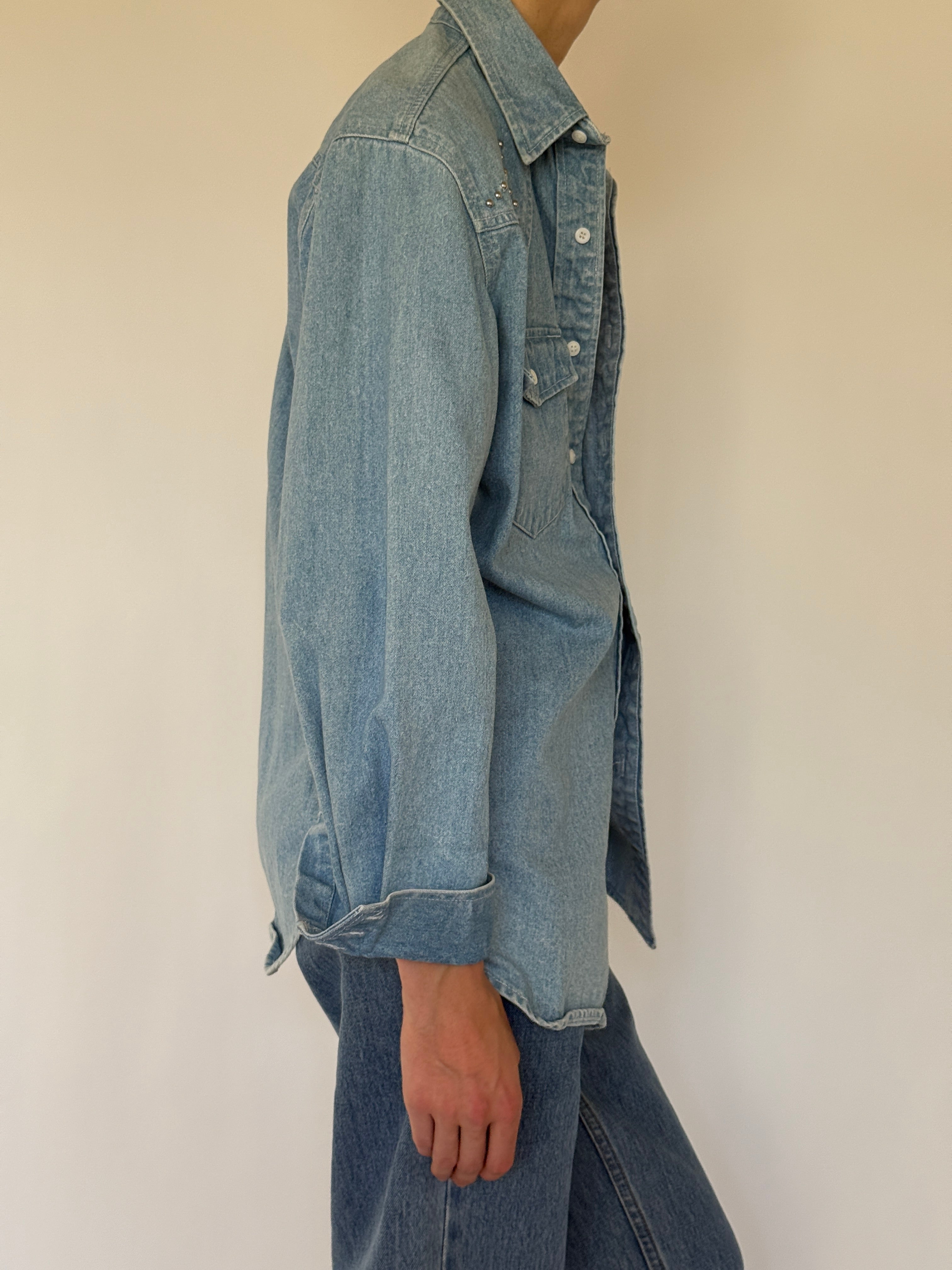 Vintage western-inspired denim shirt side view relaxed silhouette