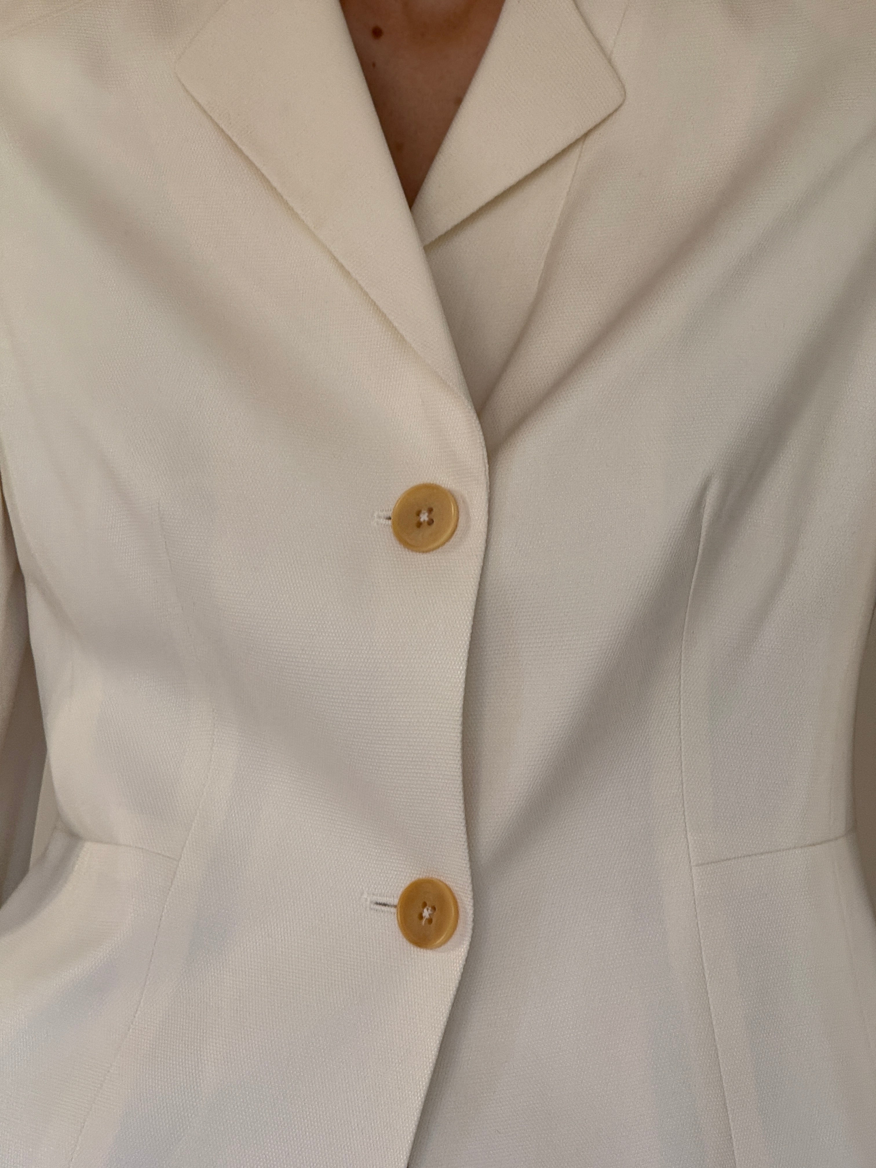 Vintage ivory tailored blazer fabric texture close-up