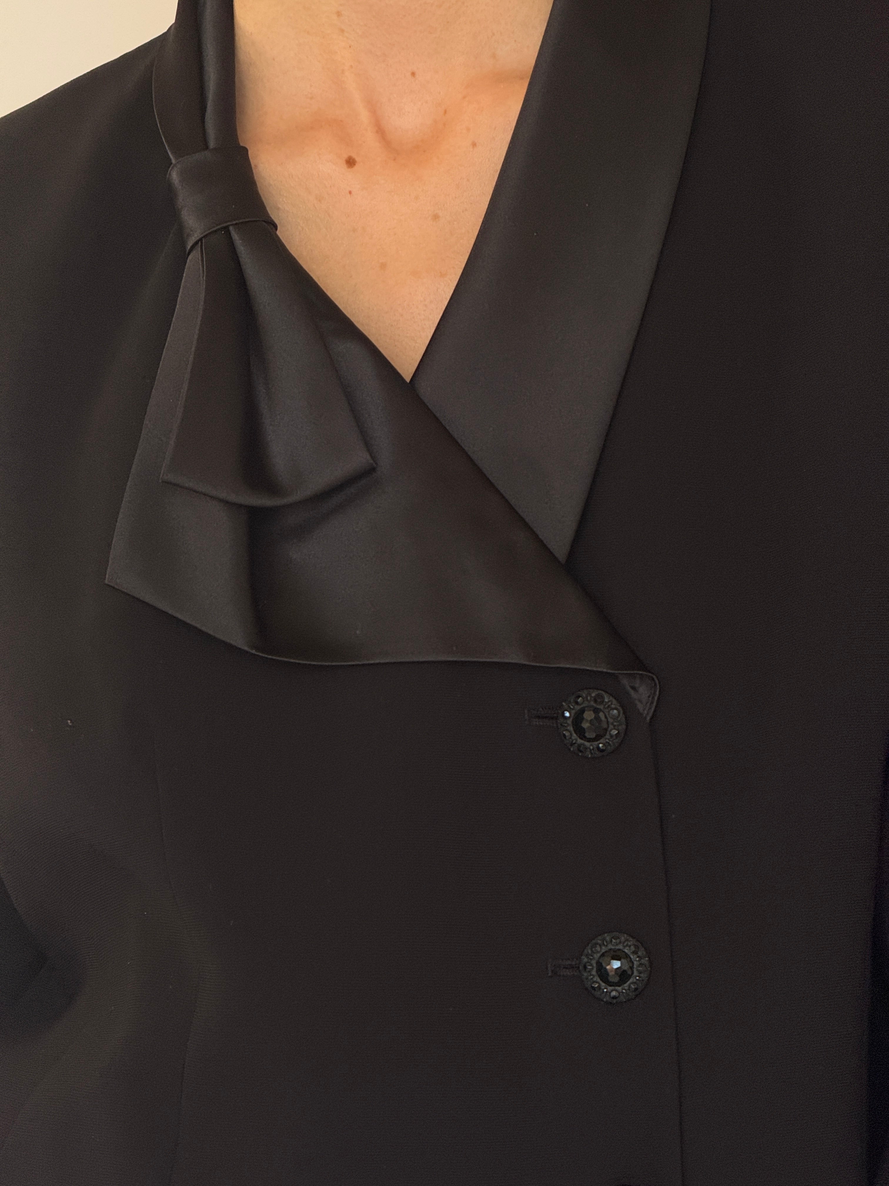 Vintage black blazer satin collar tie detail close-up