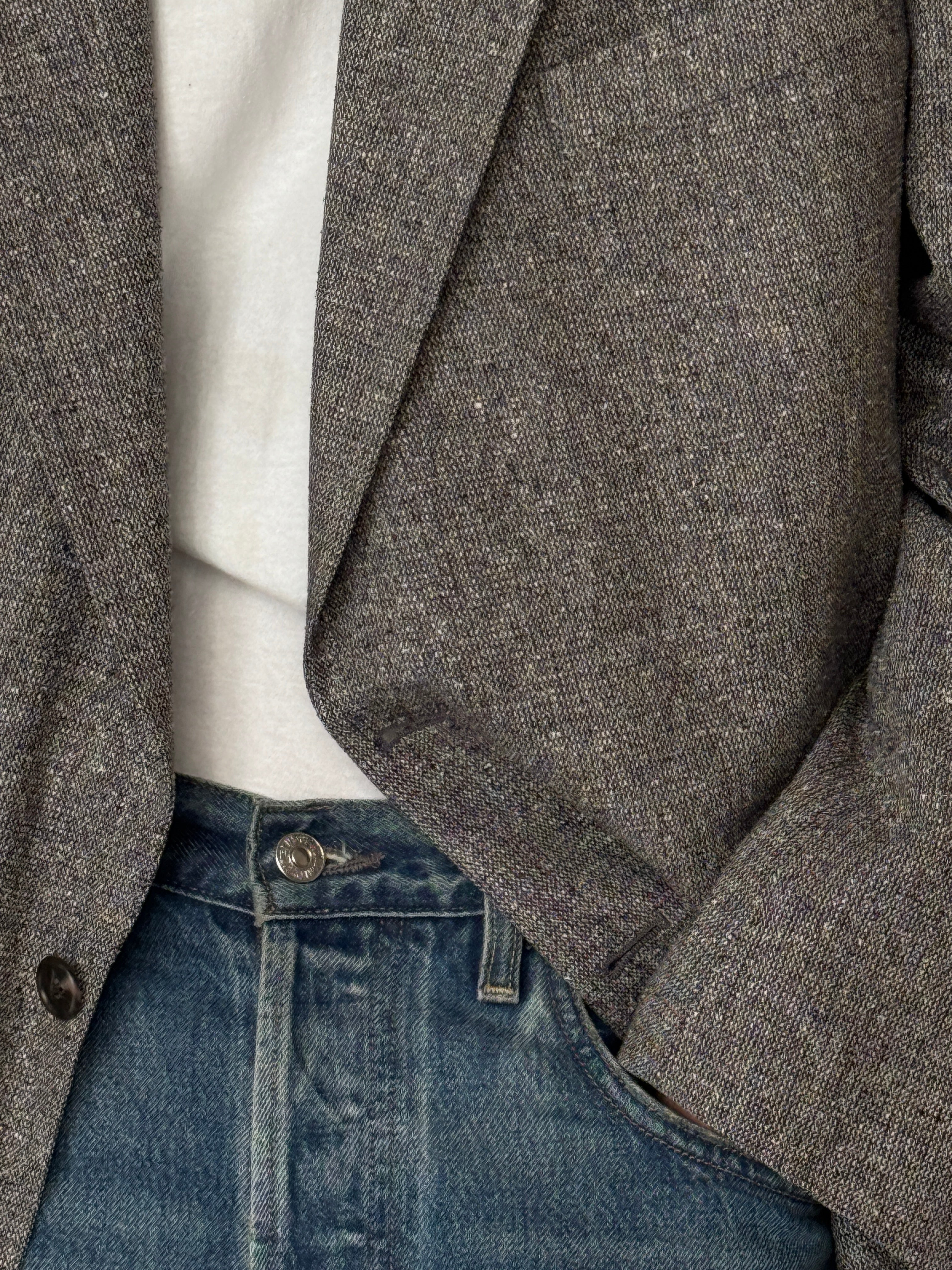 Vintage fully lined silk blazer with front flap pockets and back vent in grey close-up