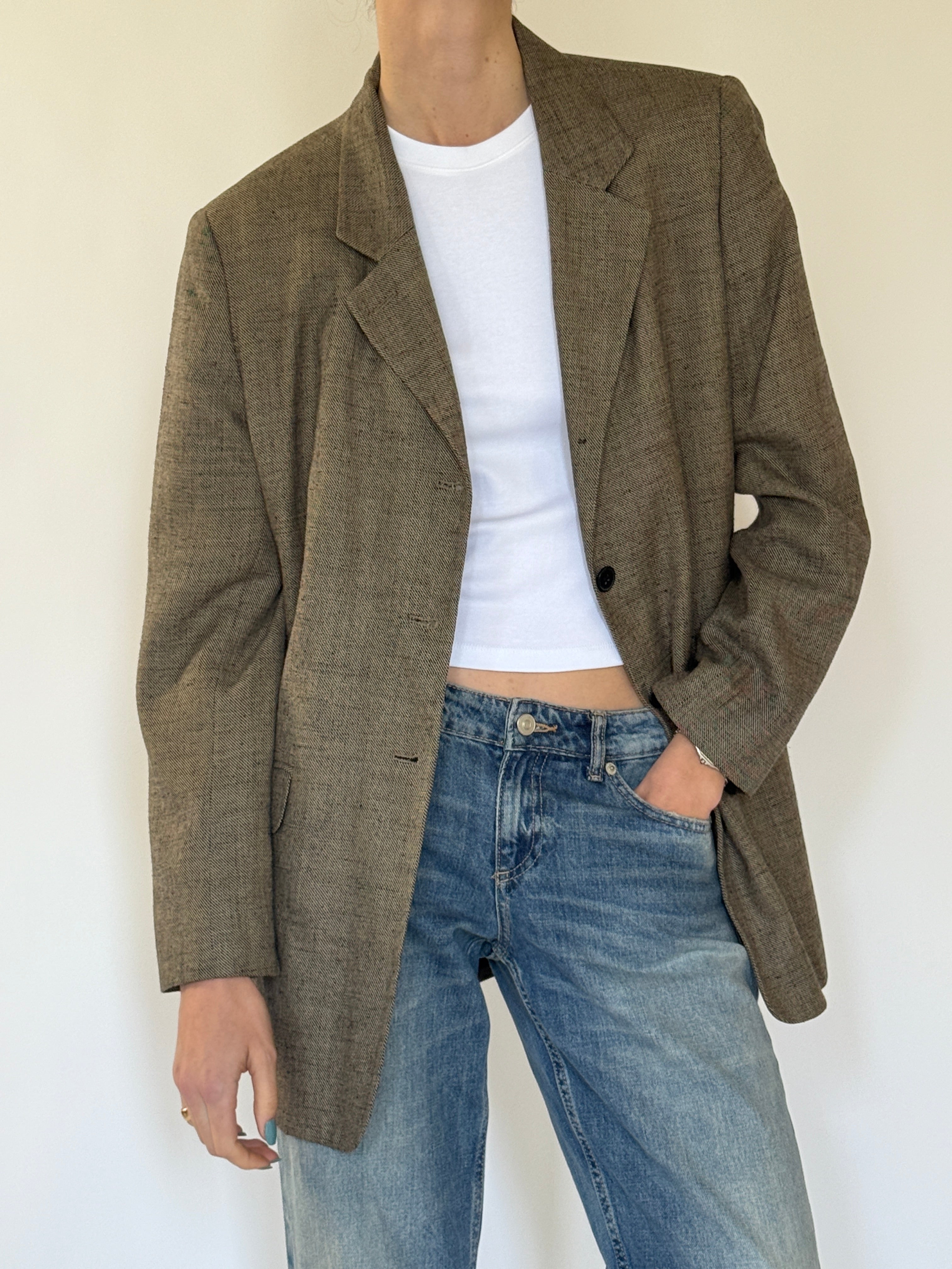 Vintage brown textured blazer close-up detail