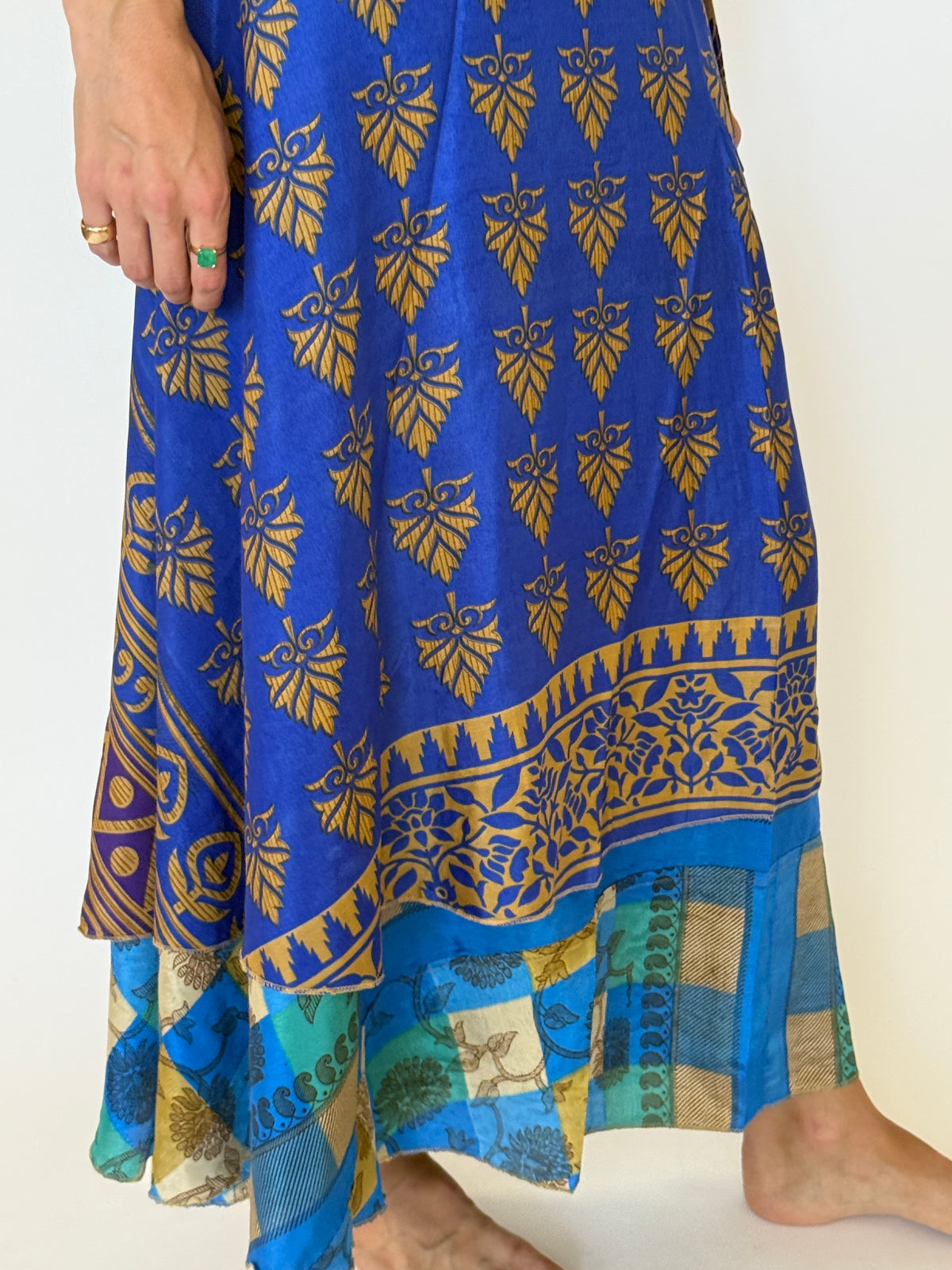 Vintage blue and gold print fabric close-up