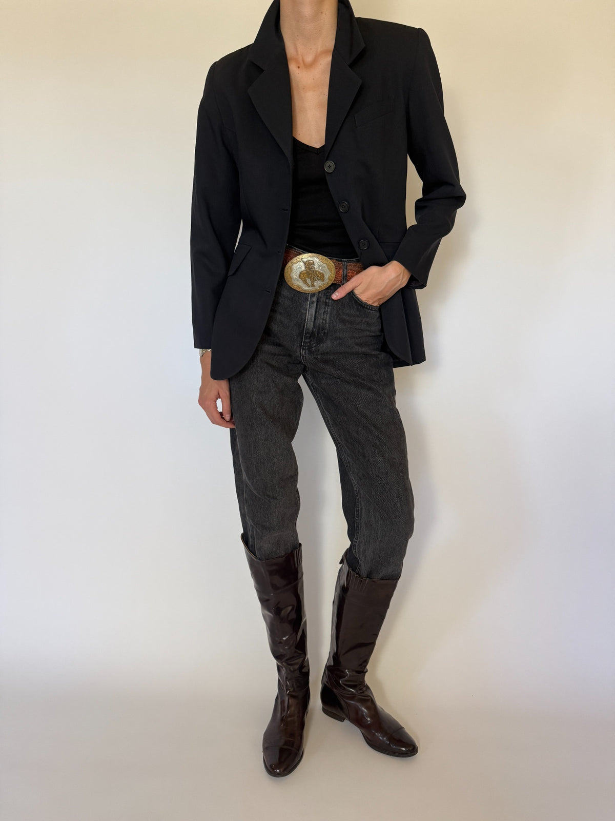 Vintage navy blazer worn open with jeans