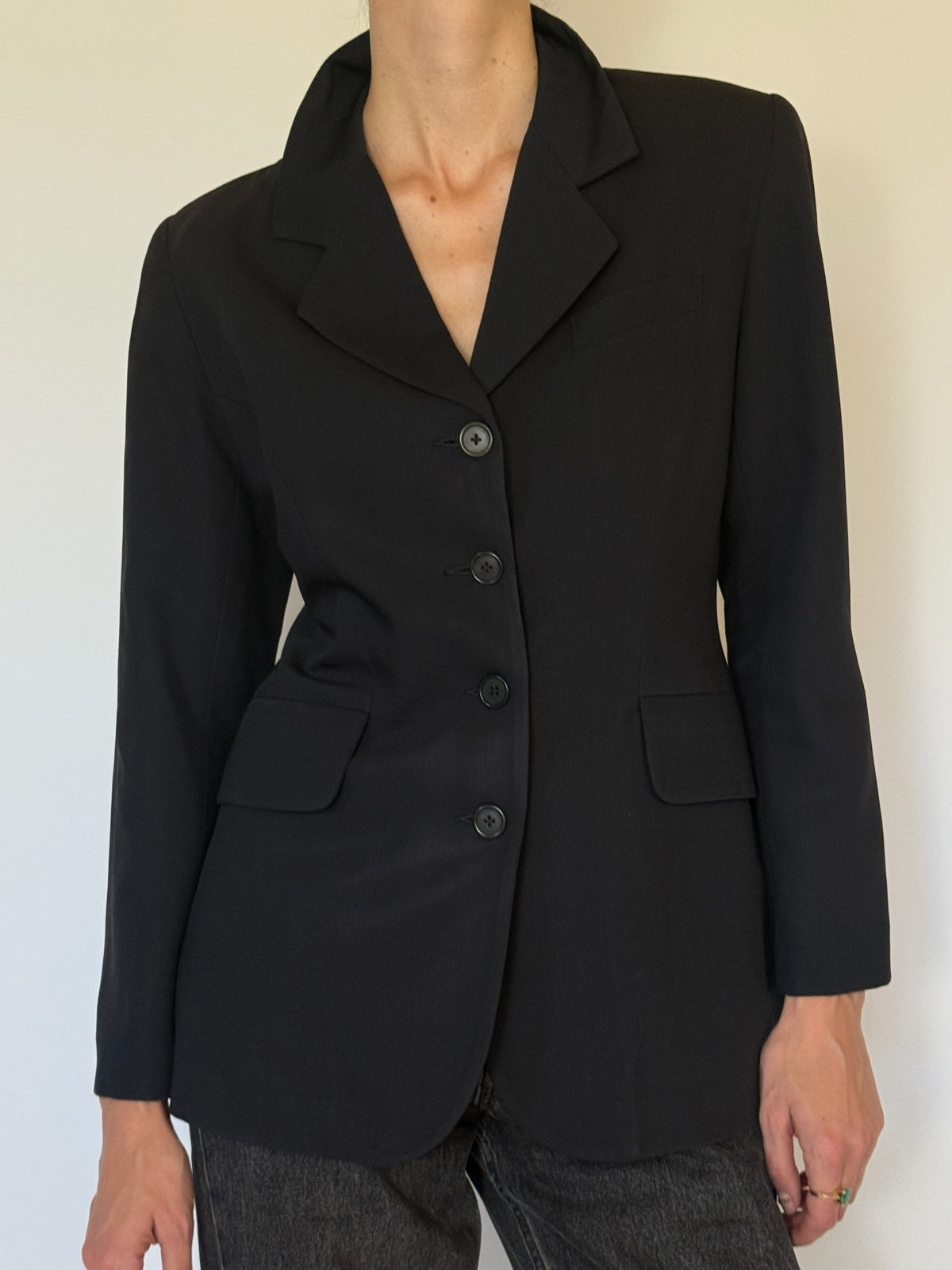 Front close-up of tailored navy blue blazer