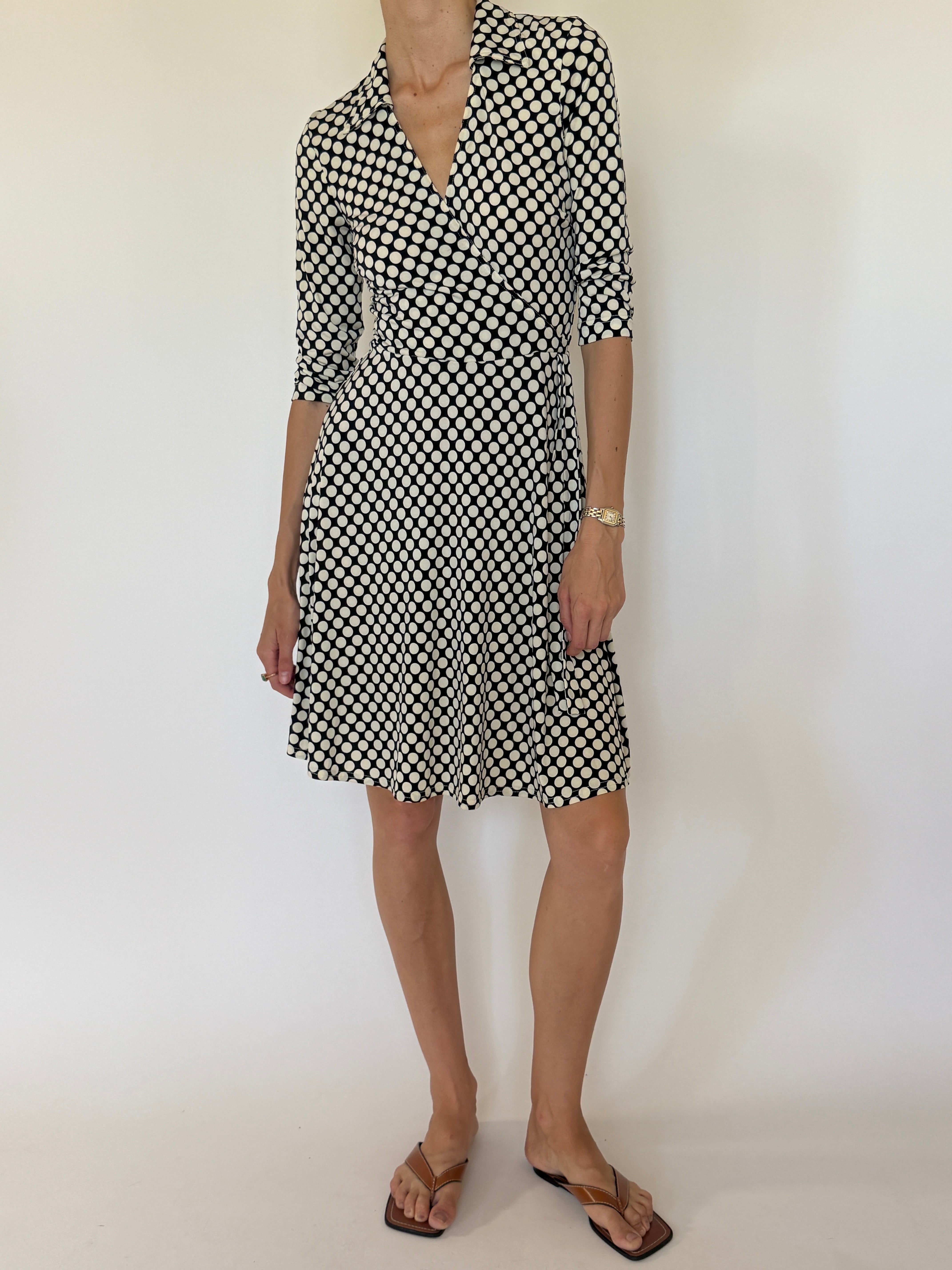 Vintage black polka dot wrap dress front view