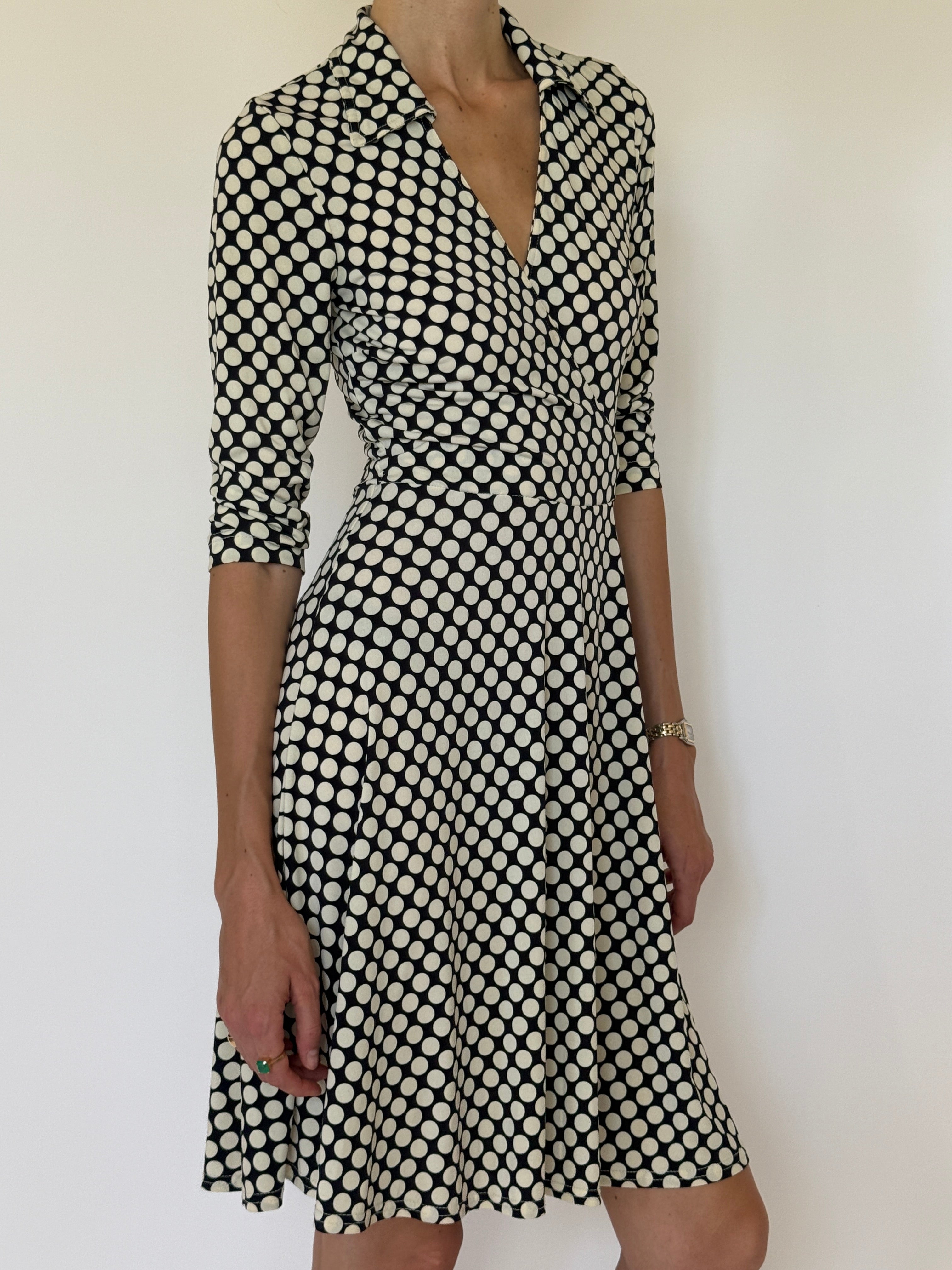 Vintage black polka dot wrap dress front view