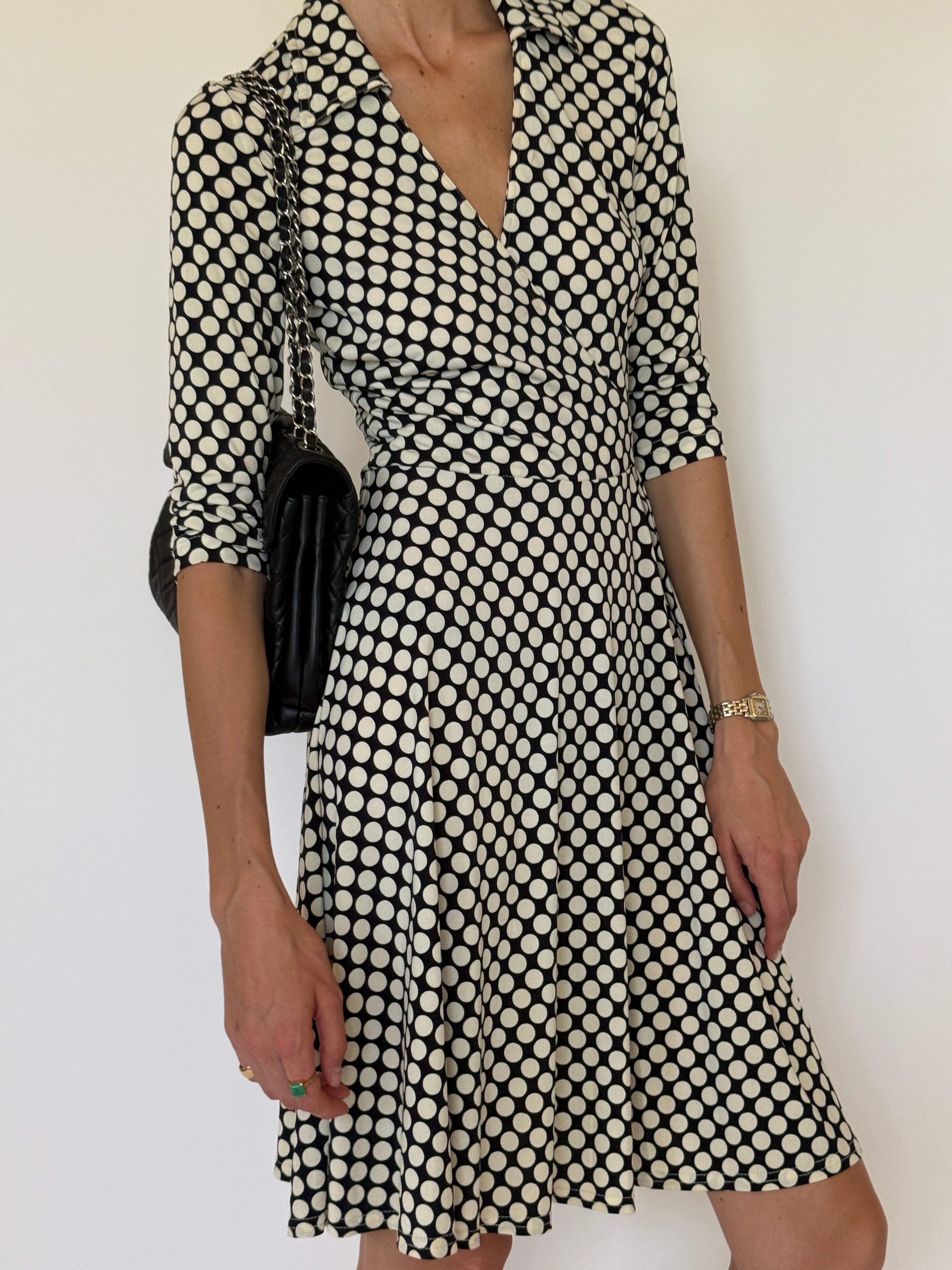 Vintage black polka dot wrap dress front view
