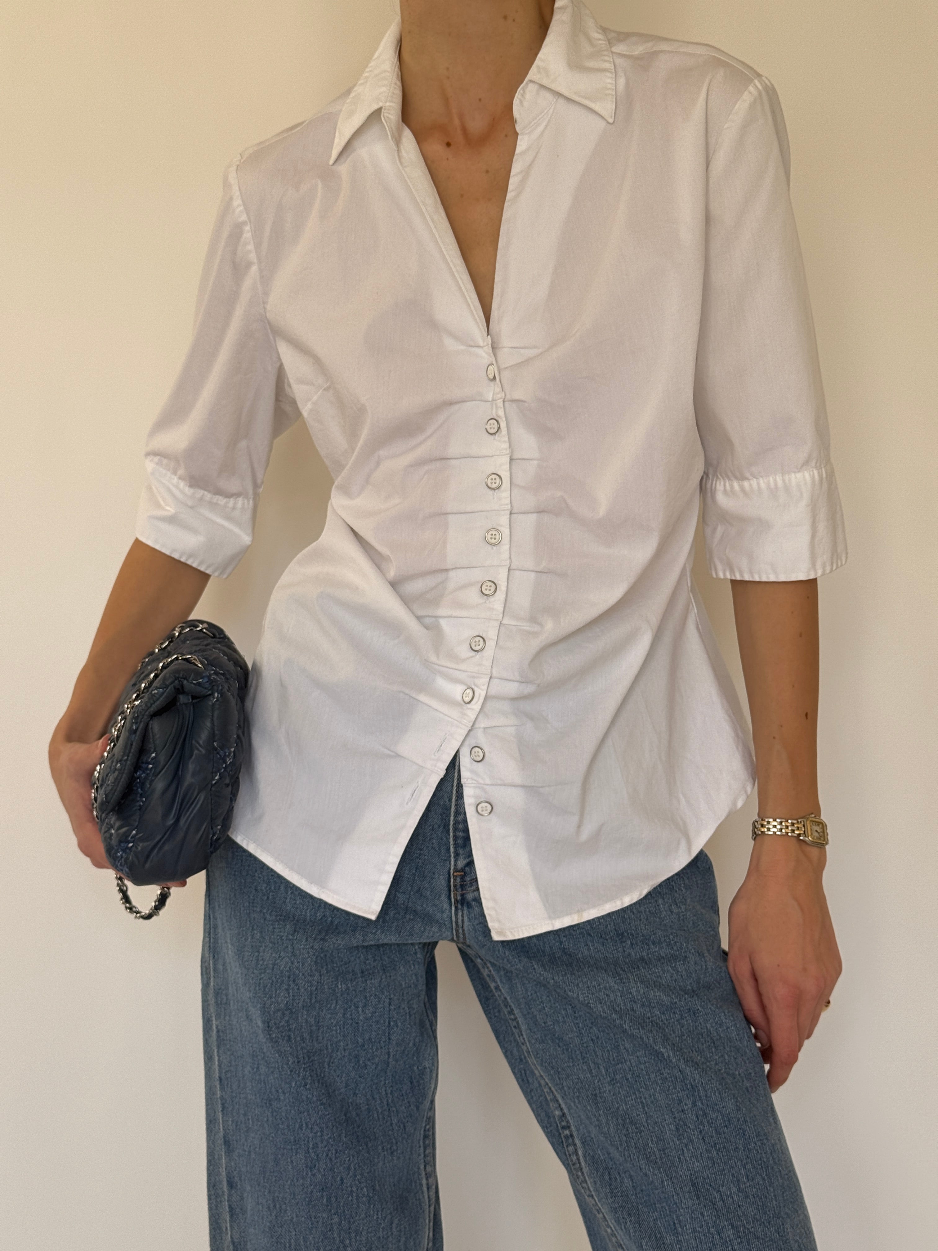Vintage white ruched fitted shirt fabric close-up