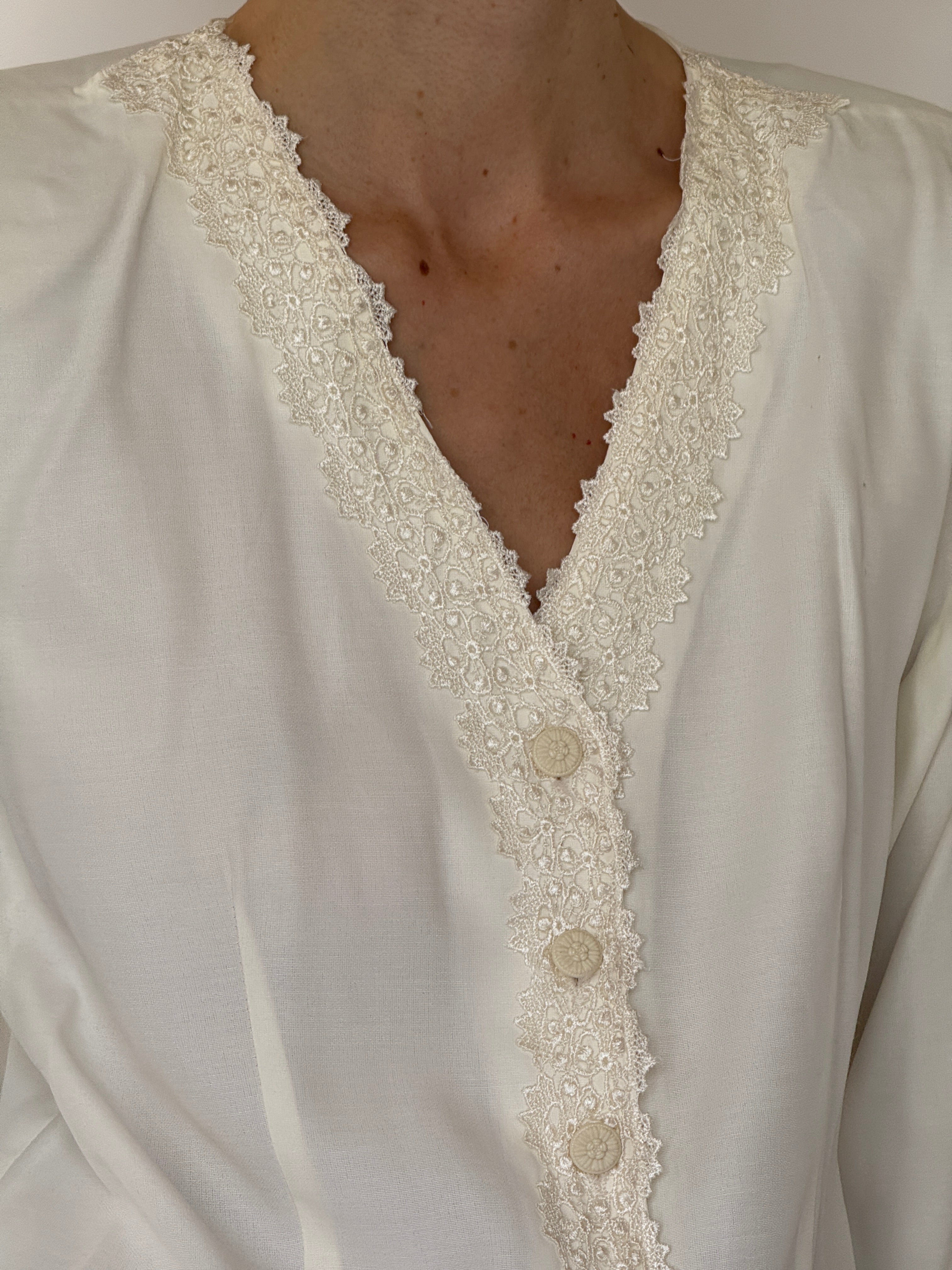 Vintage ivory lace trim neckline detail