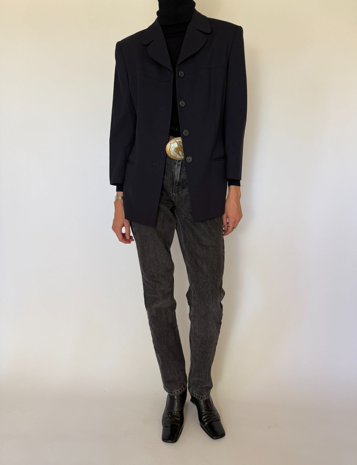 Front full-length view of vintage navy blue fitted blazer