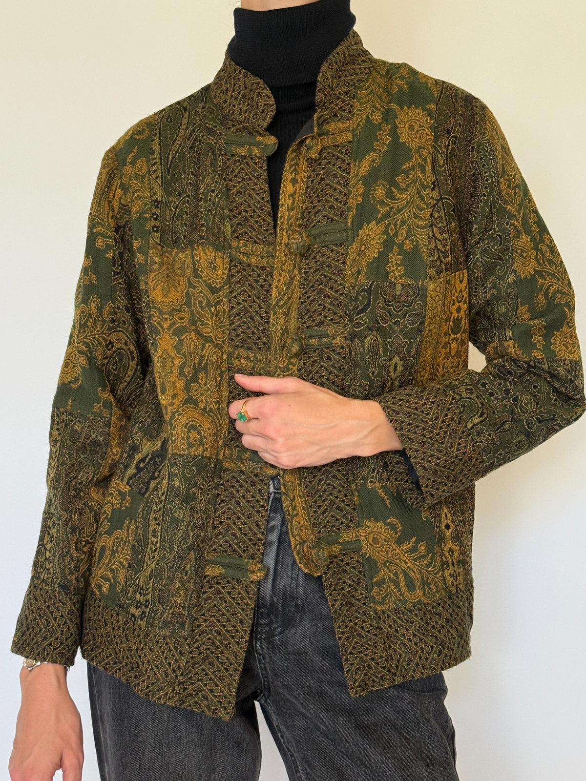 Front view vintage olive green and mustard patchwork tapestry jacket