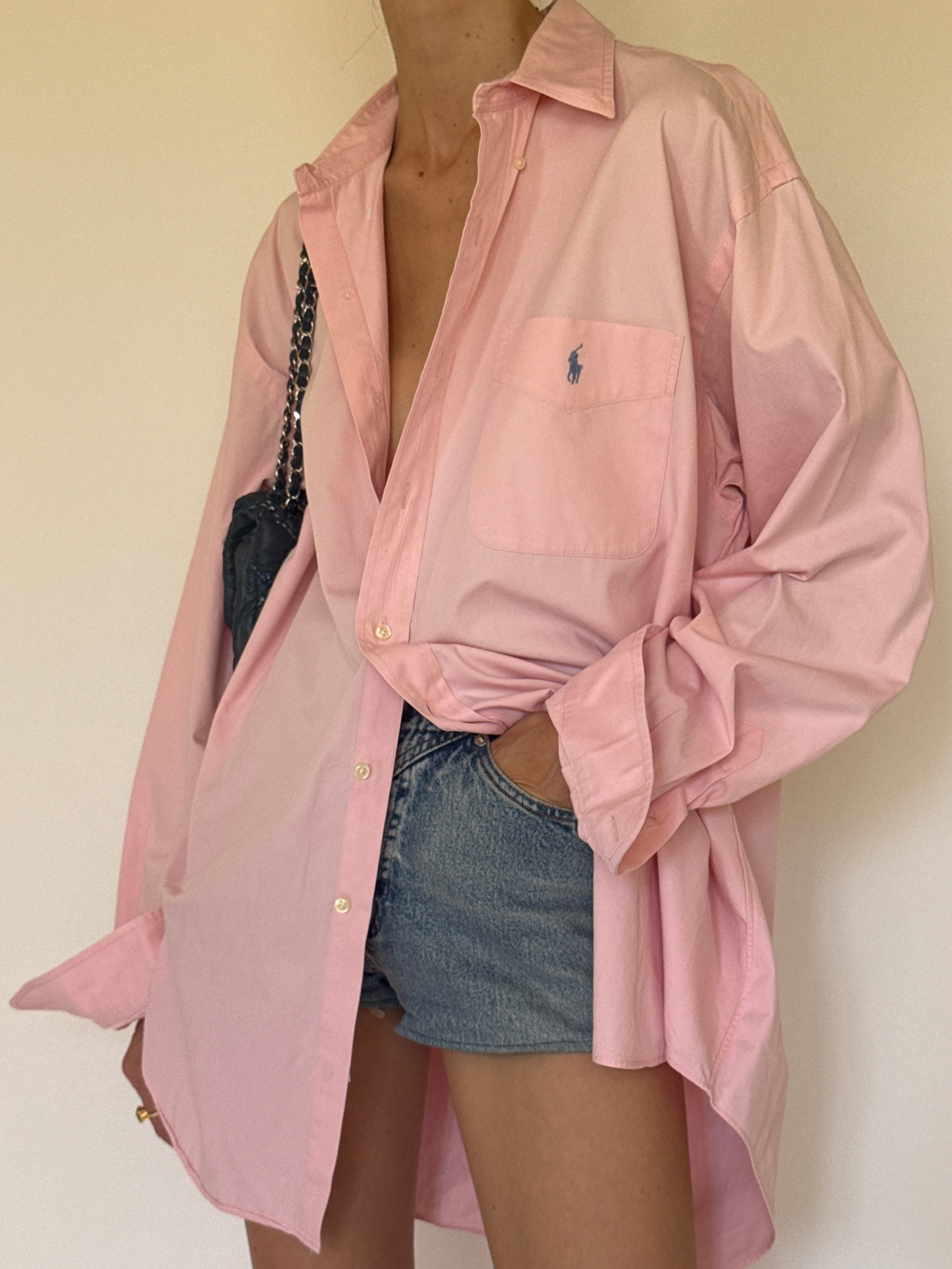 Vintage Polo Ralph Lauren oversized pink button-up shirt side view.