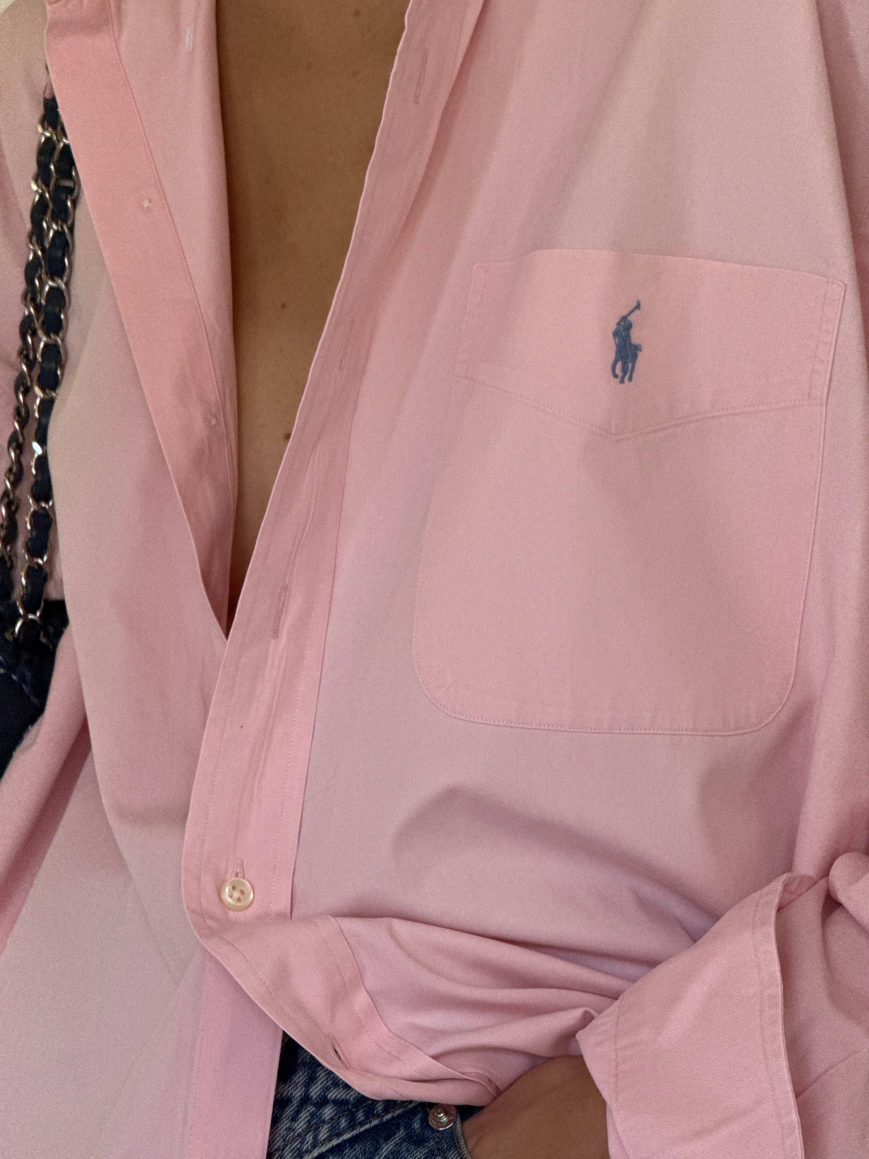 Vintage Polo Ralph Lauren oversized pink cotton button-up shirt chest pocket detail.