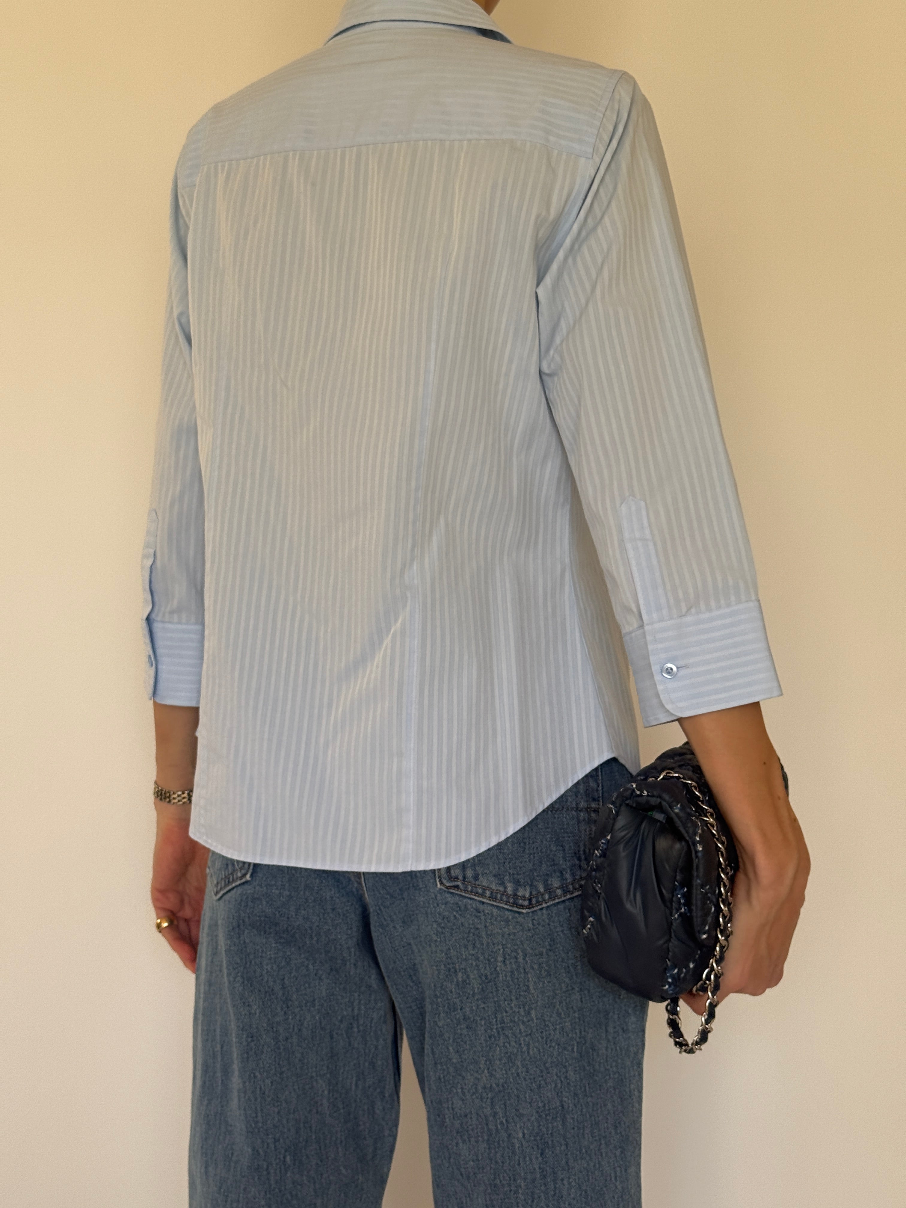 Vintage light blue striped button-up shirt back view