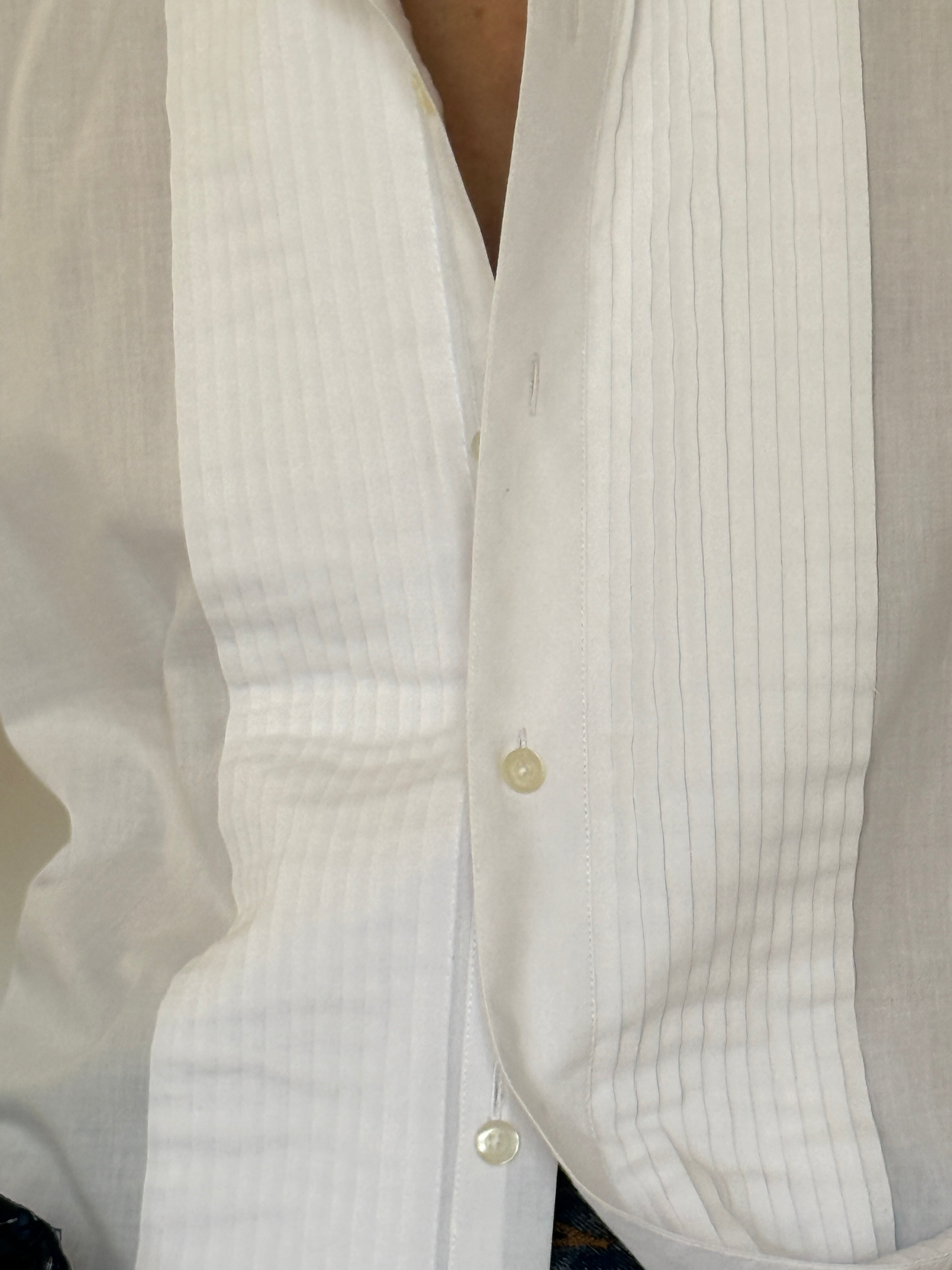 Vintage white shirt button detail close-up