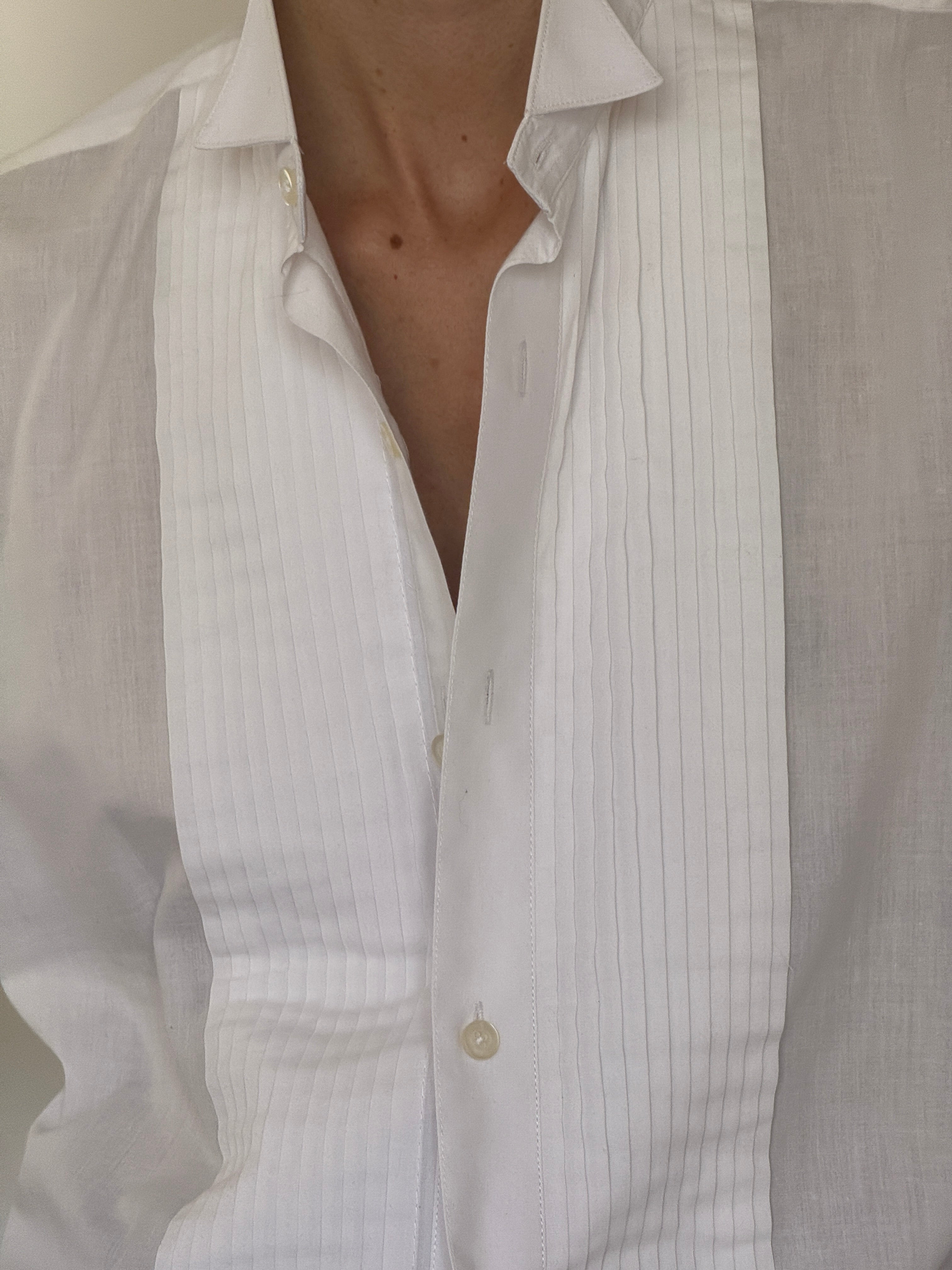 Vintage white shirt pleated front detail close-up