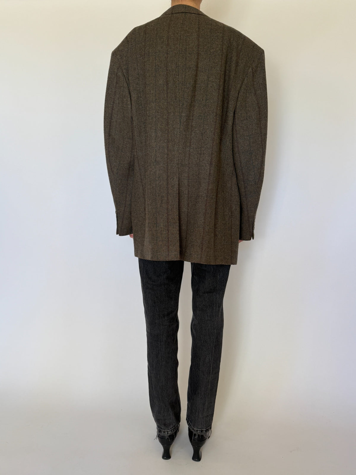 Back view of oversized brown herringbone blazer