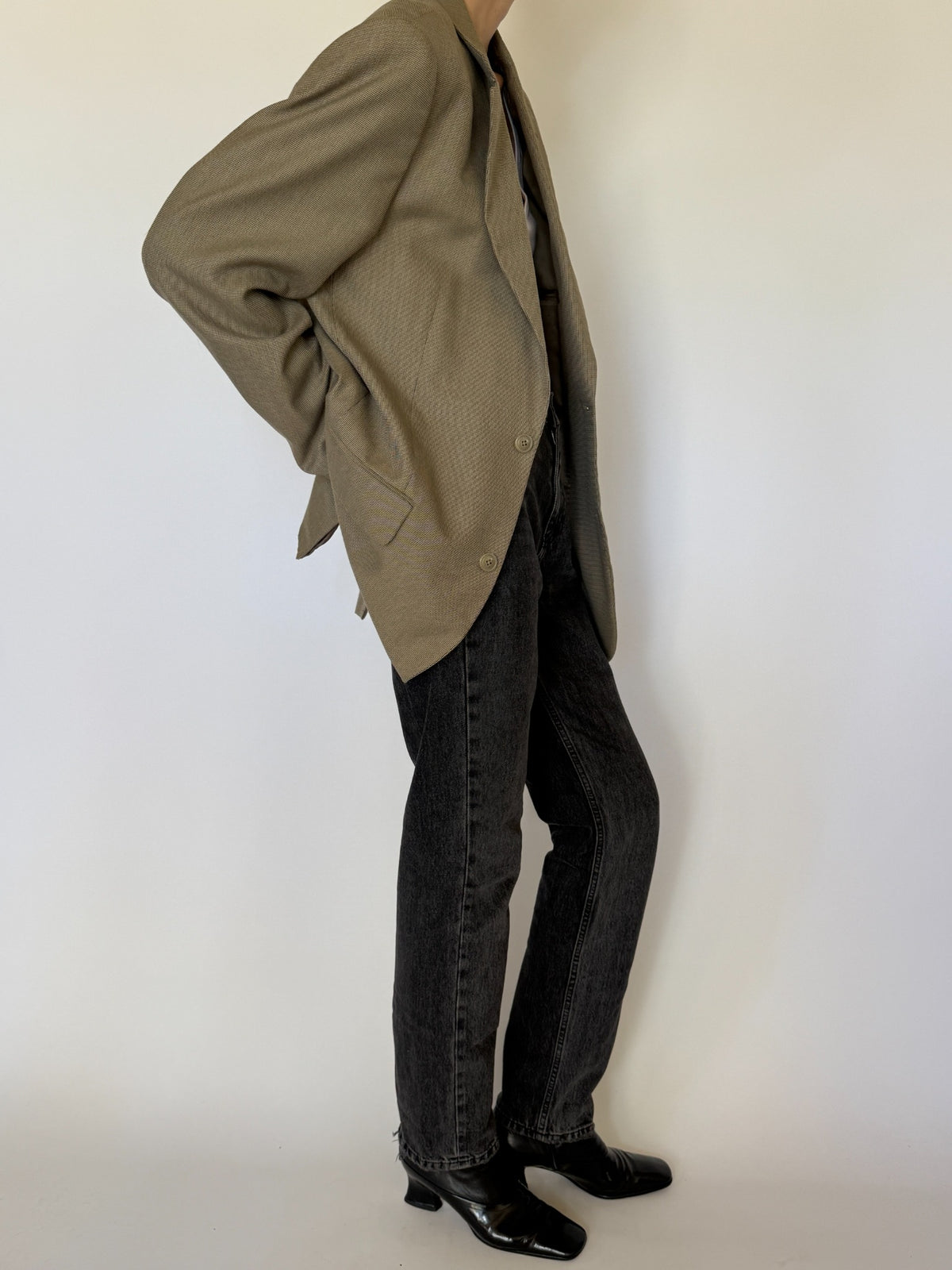 Close up of notch lapels and tailored shoulder