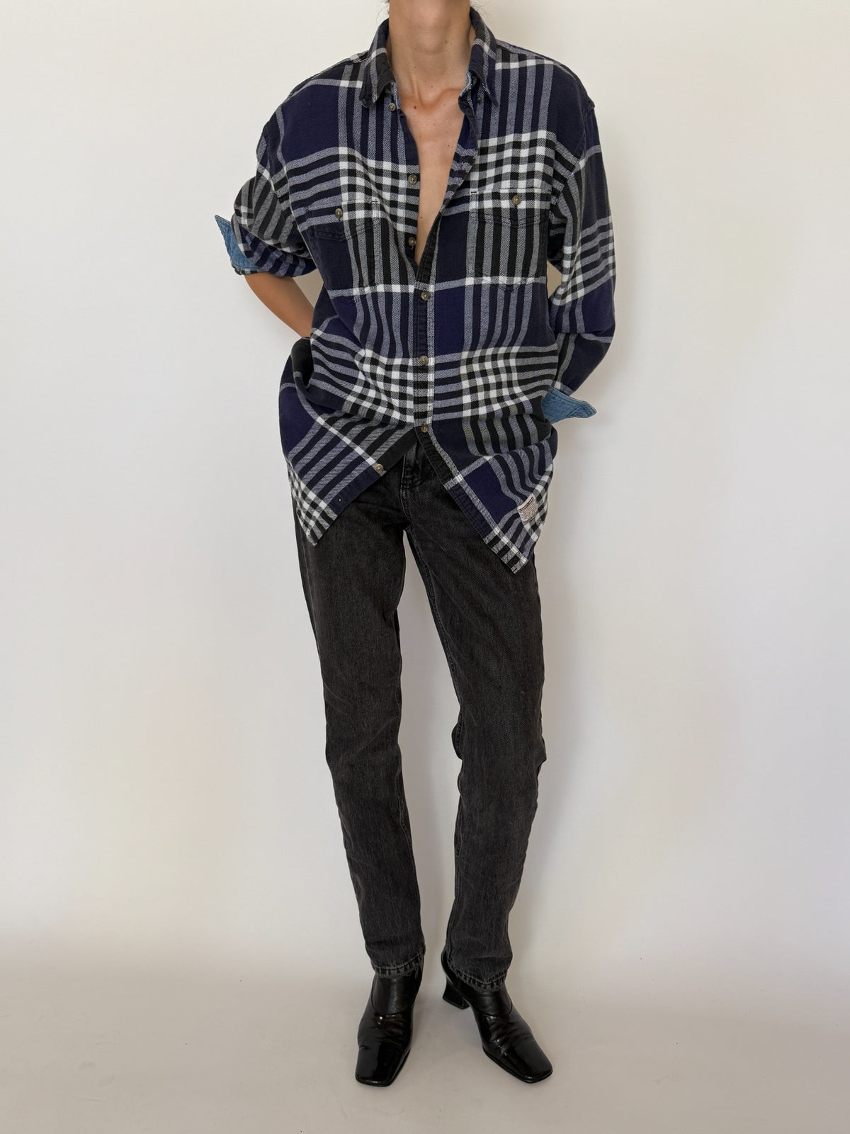 Front styling view of vintage plaid shirt with contrasting denim cuffs