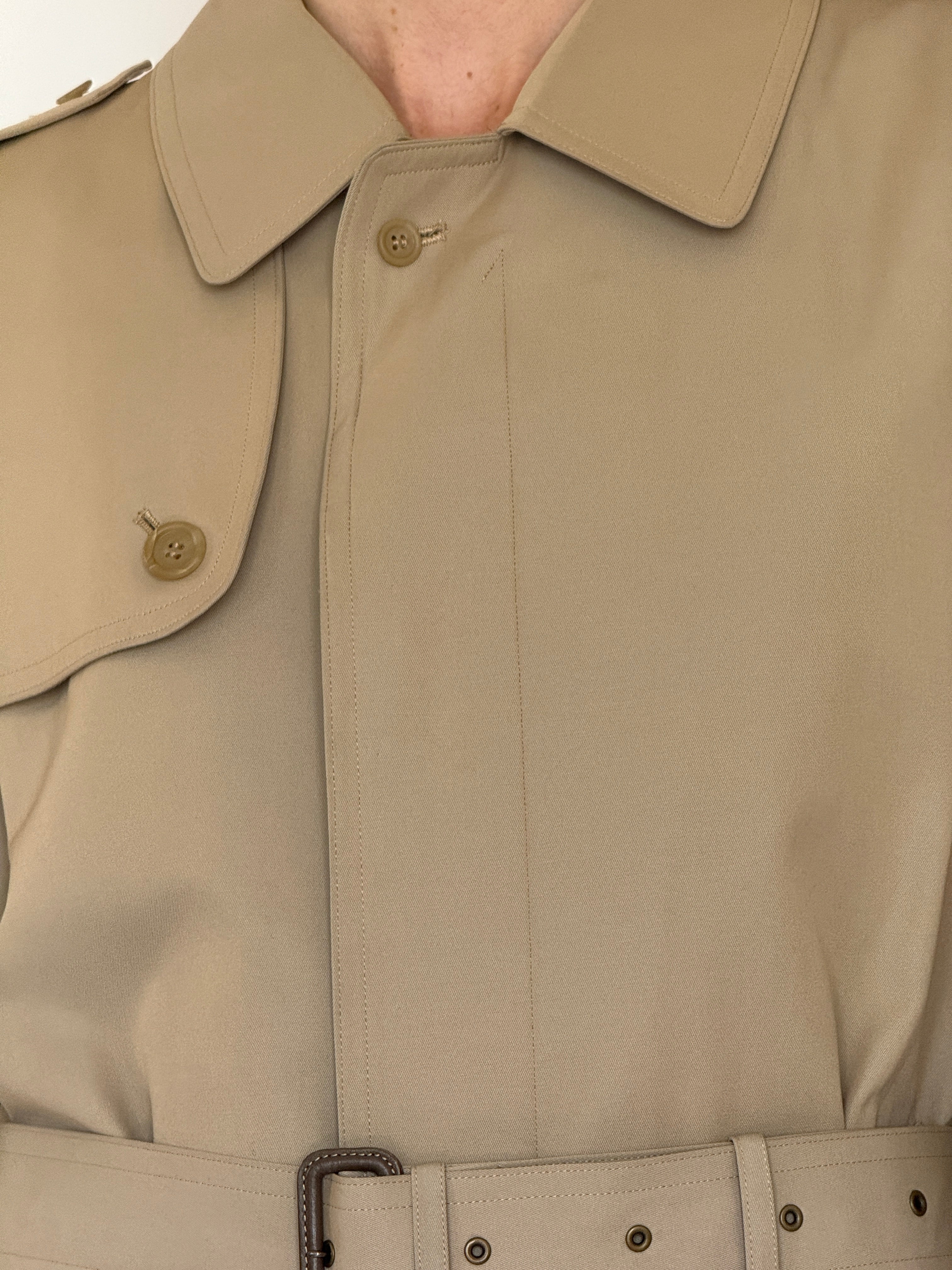 Vintage beige trench coat collar and front placket detail